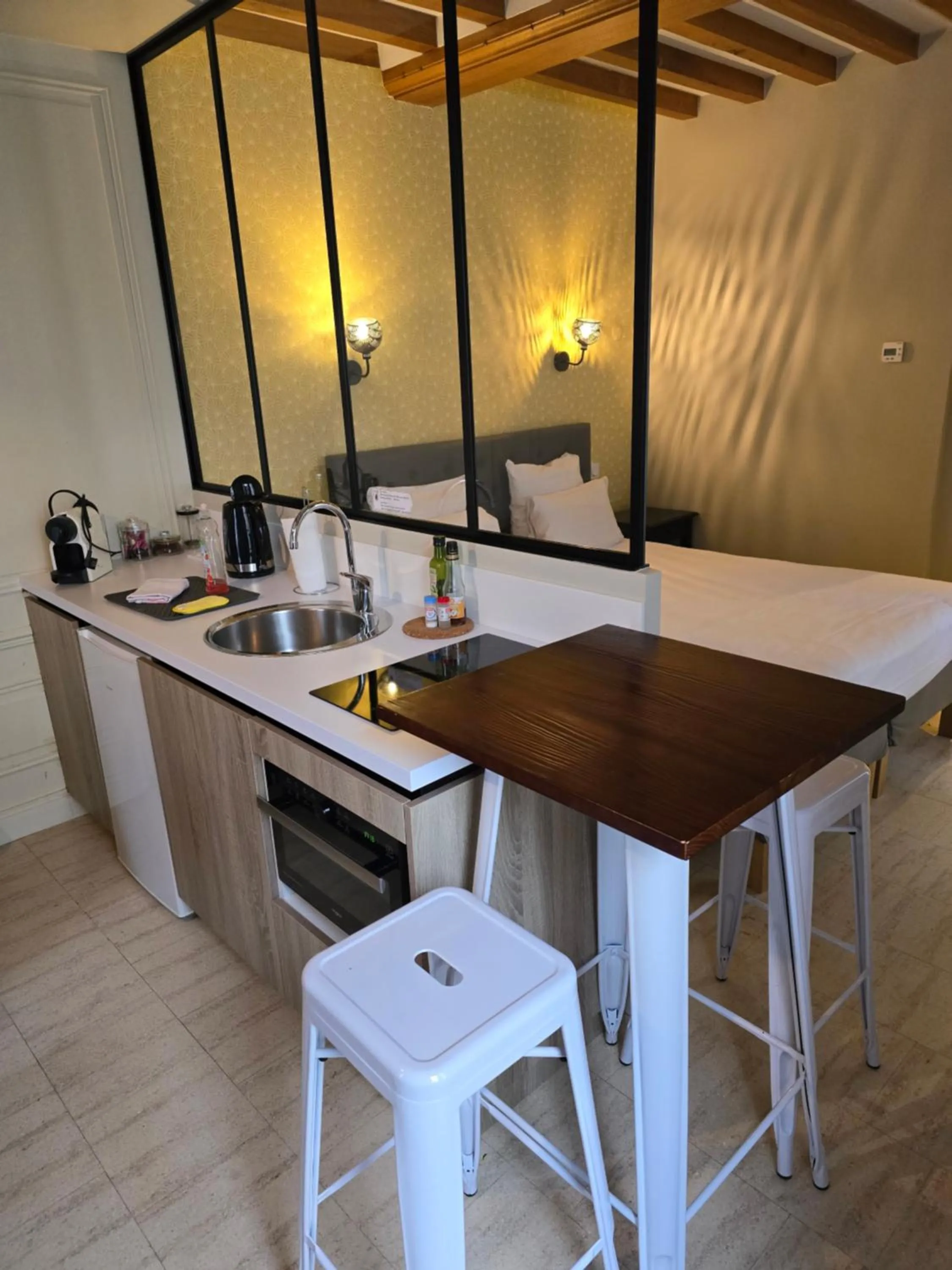 Kitchen or kitchenette in Au Loup Historic Apartments