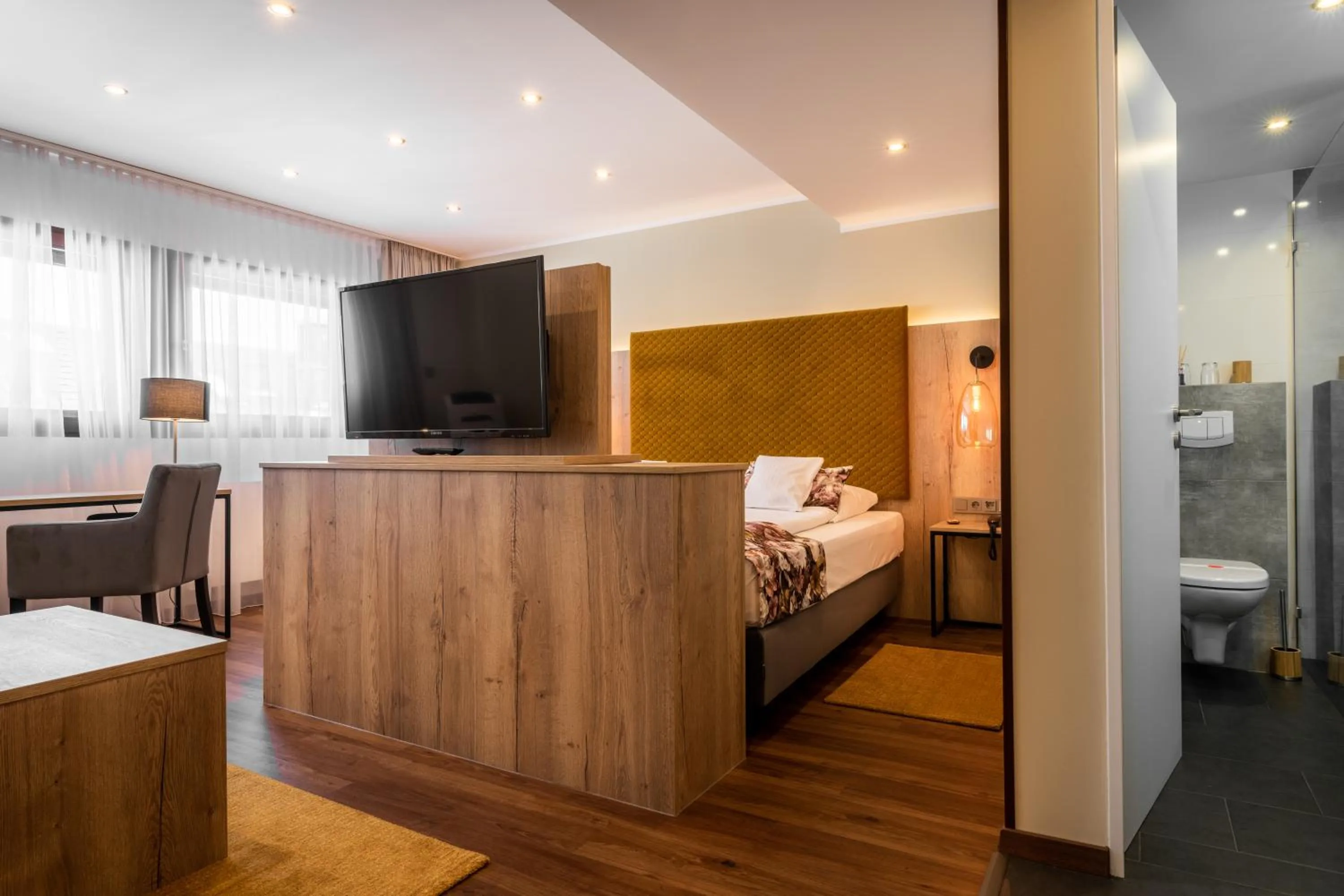 Living room, Bed in Hotel Spahr