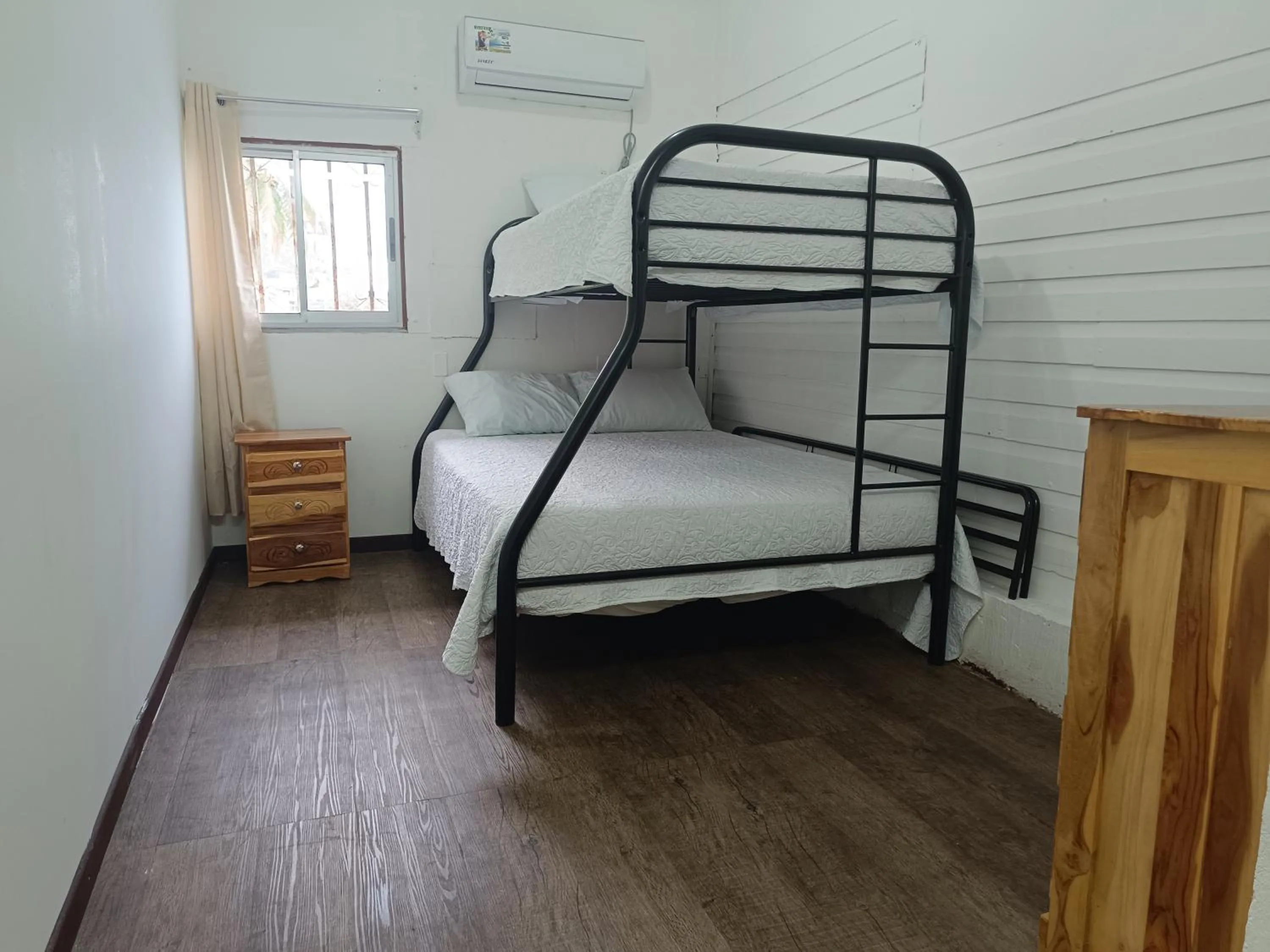 Photo of the whole room, Bed in Banana Bay Marina