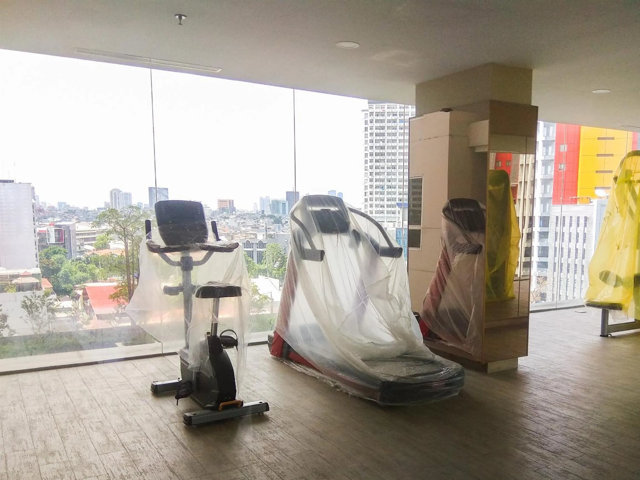 Fitness centre/facilities in Prime Location Studio Apartment at Elpis Residence near Ancol By Travelio