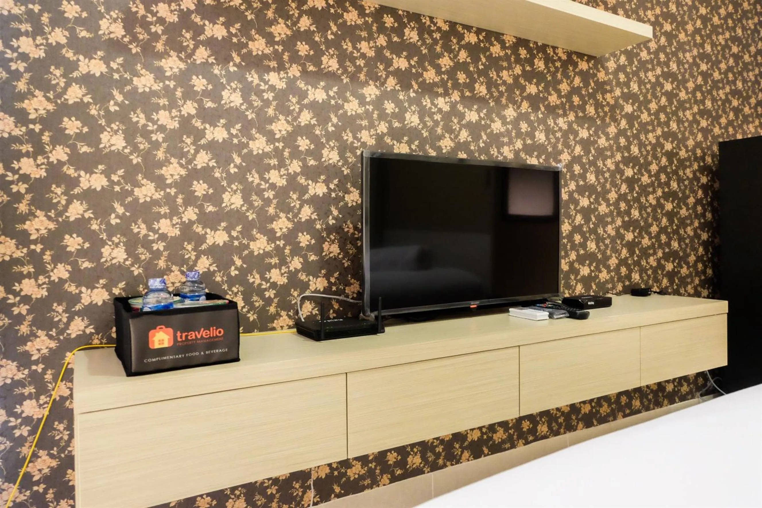TV and multimedia in Prime Location Studio Apartment at Elpis Residence near Ancol By Travelio