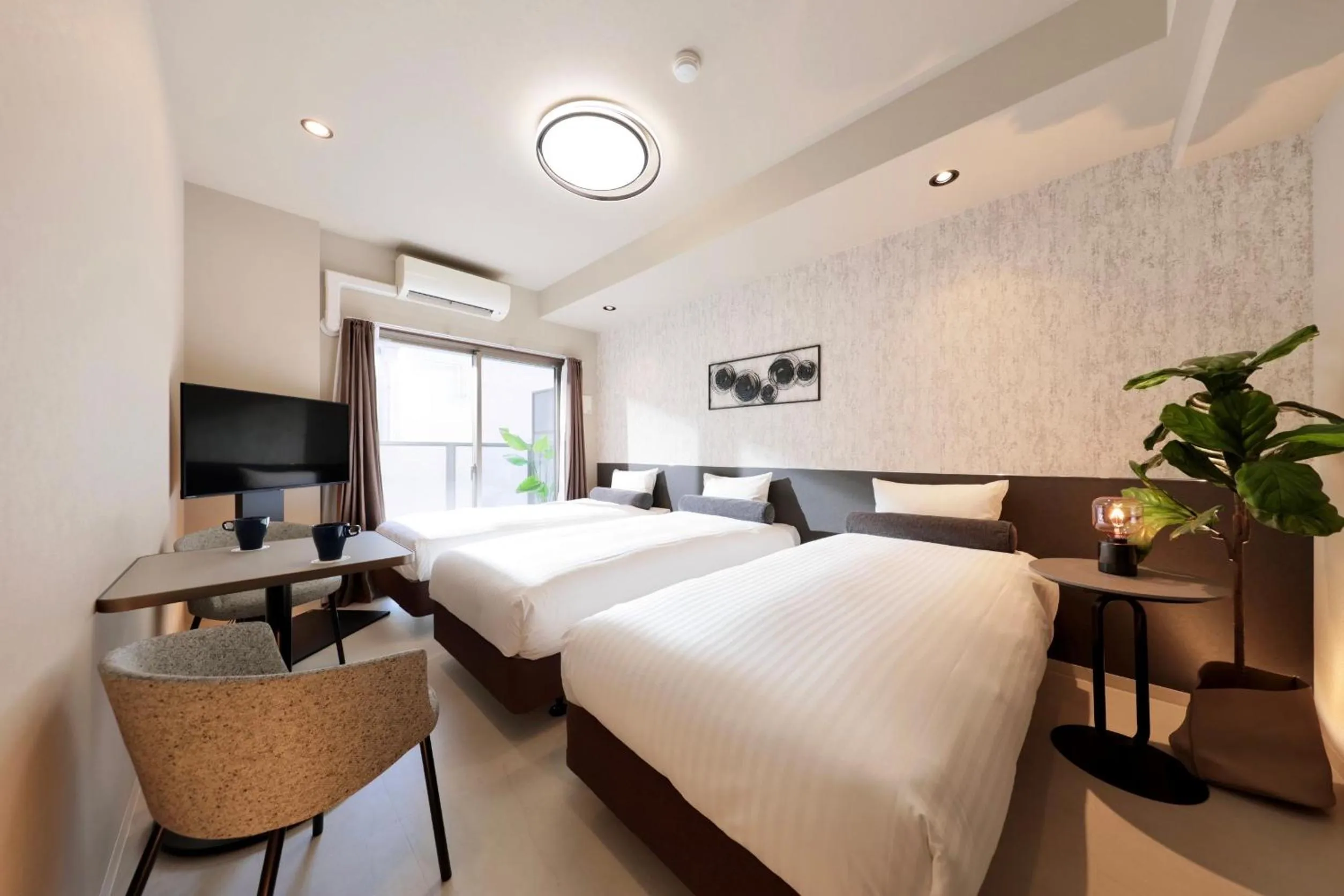 Photo of the whole room, Bed in Dotombori Crystal Hotel 3