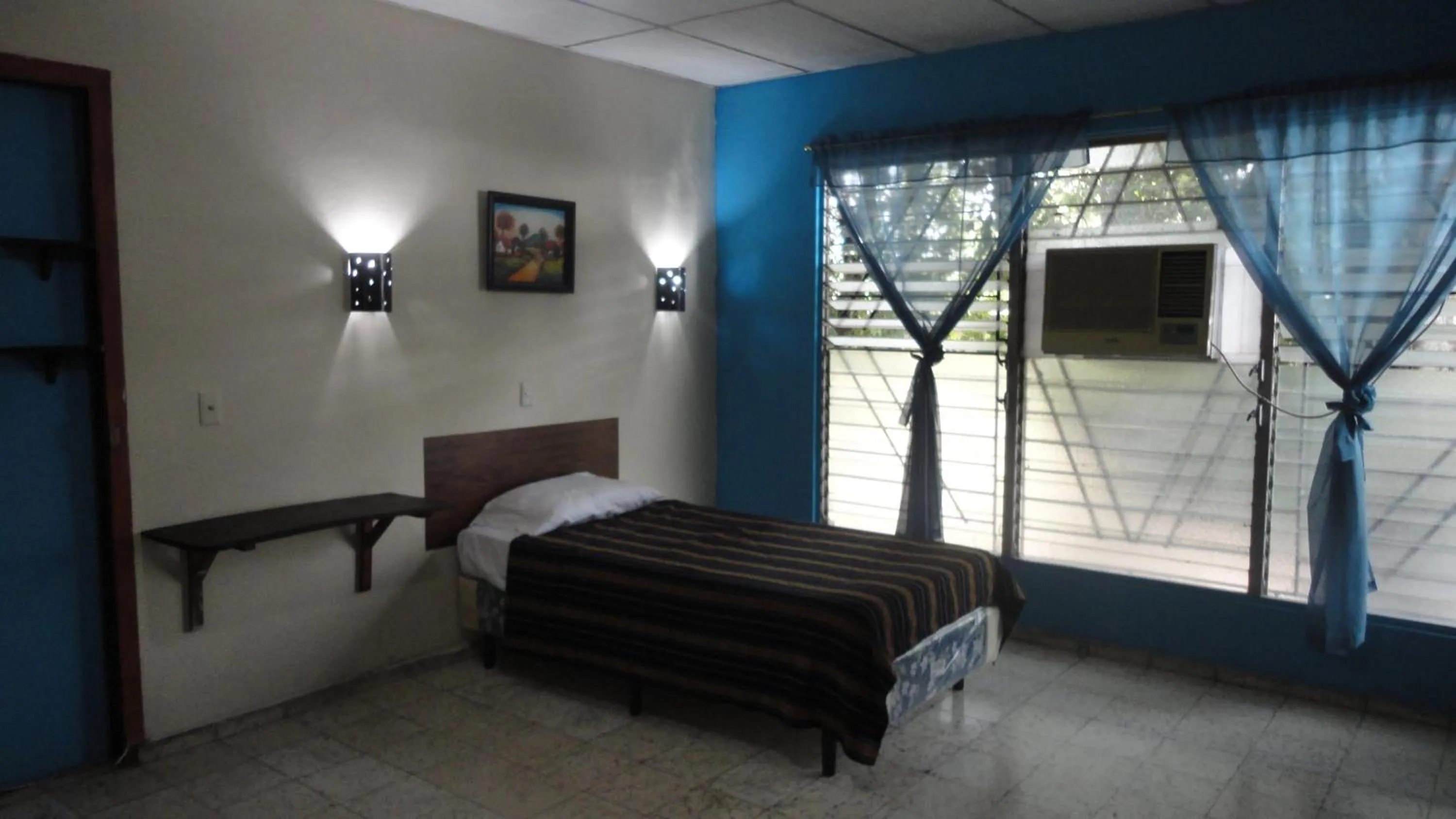 Triple Room with Private Bathroom in Hostal Doña Marta