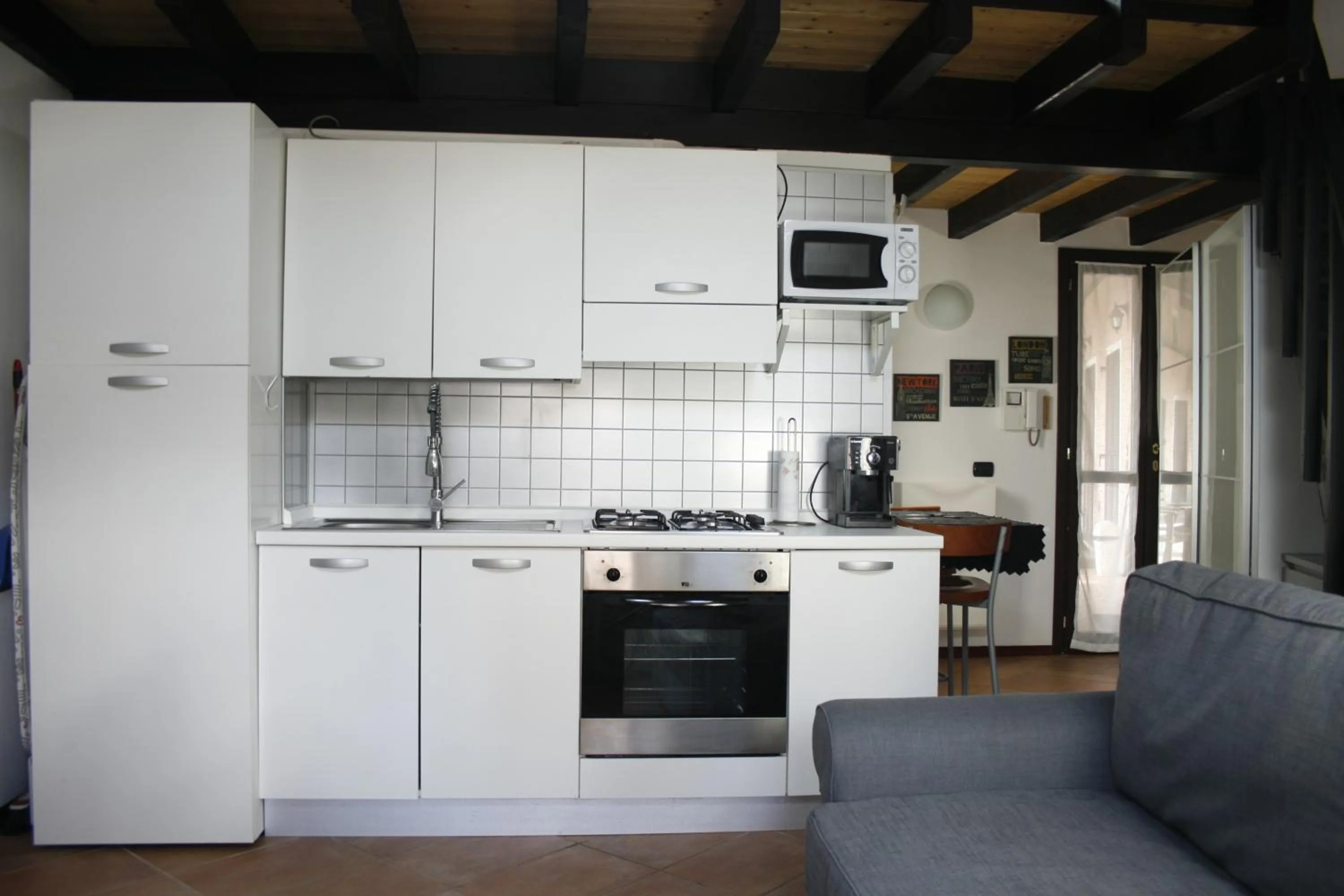 Kitchen or kitchenette in Appartamenti Old Farm