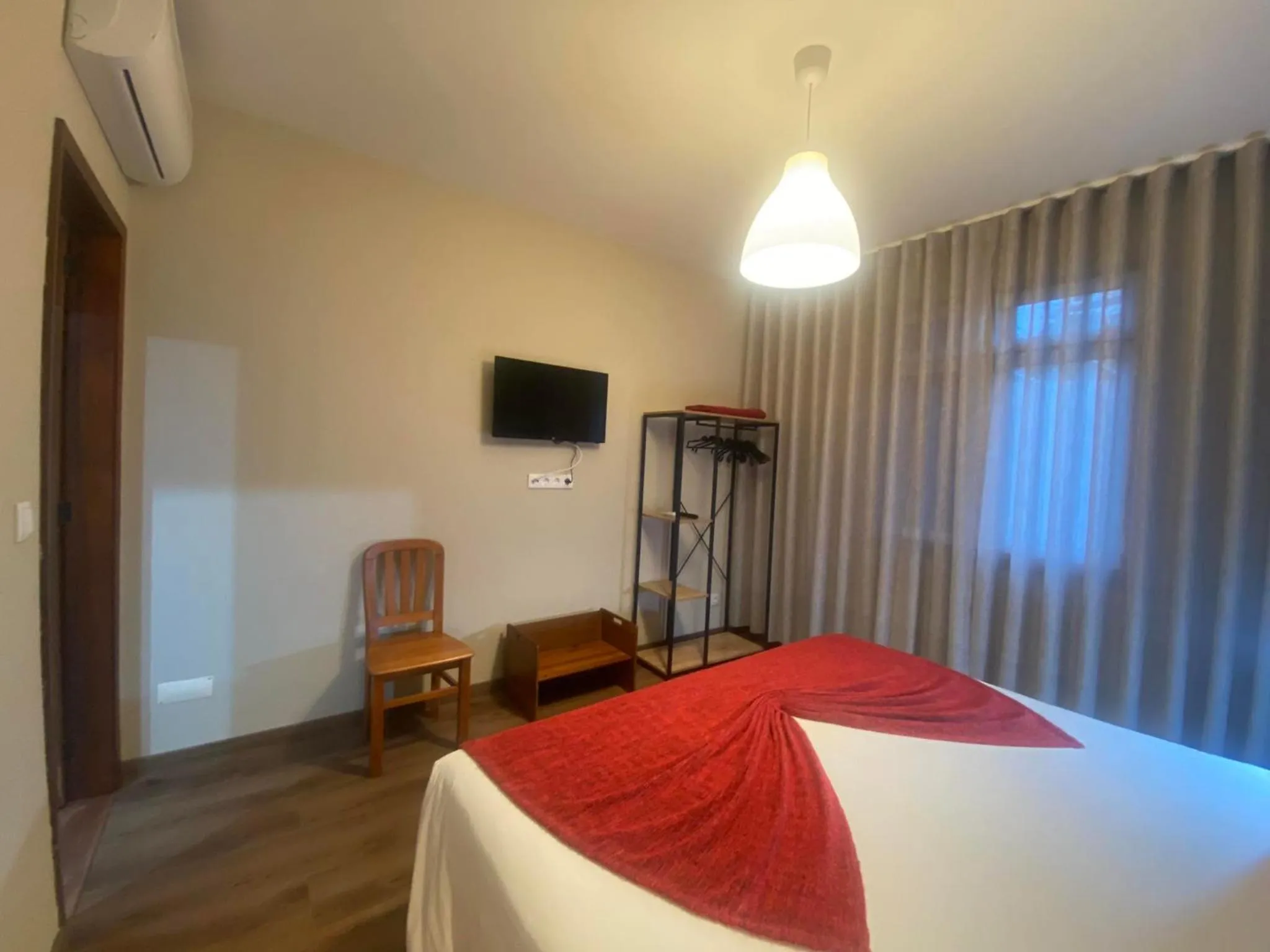 Bed in Apartamentos São João