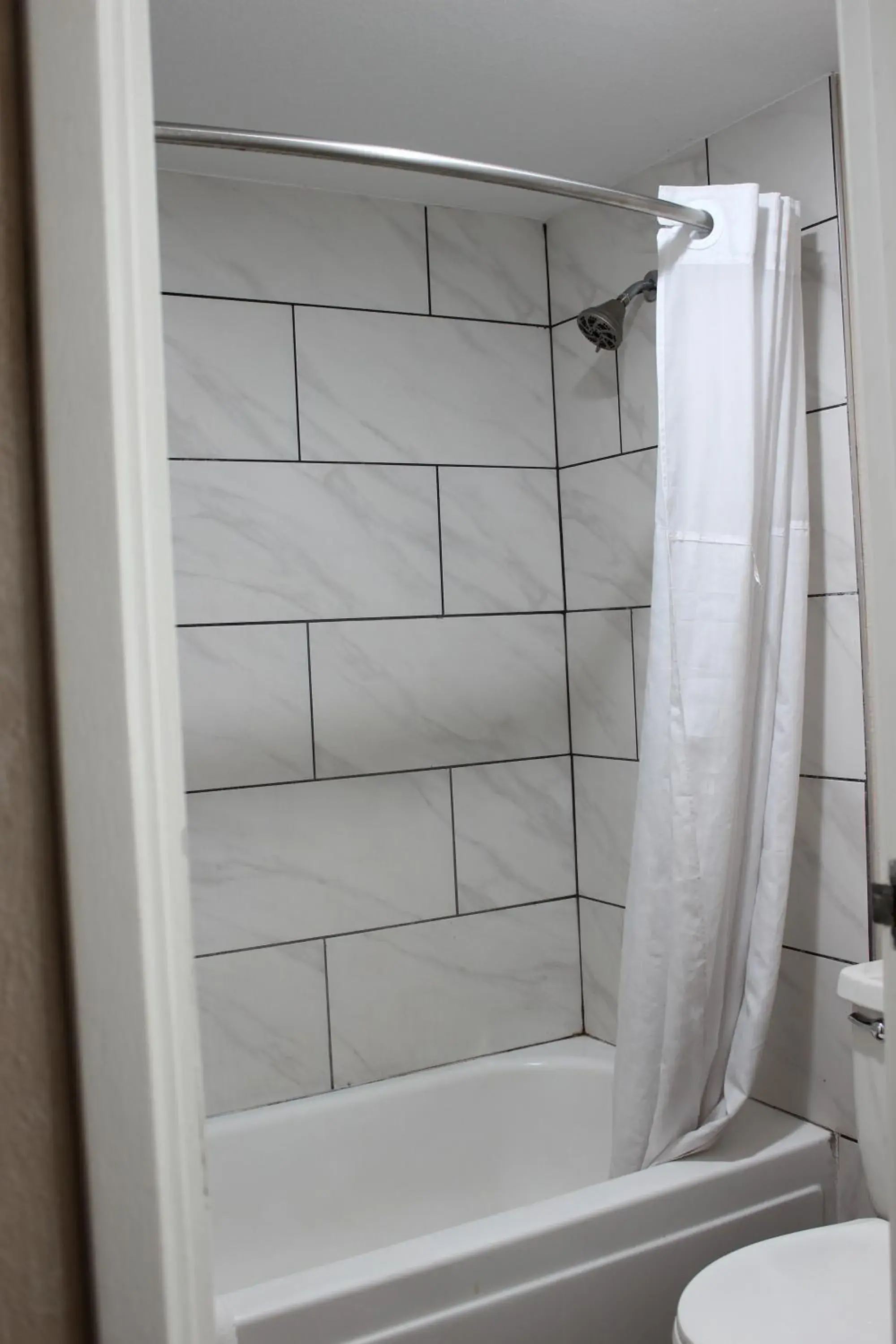 Shower in Baymont by Wyndham Abilene Shower in Baymont by Wyndham Abilene