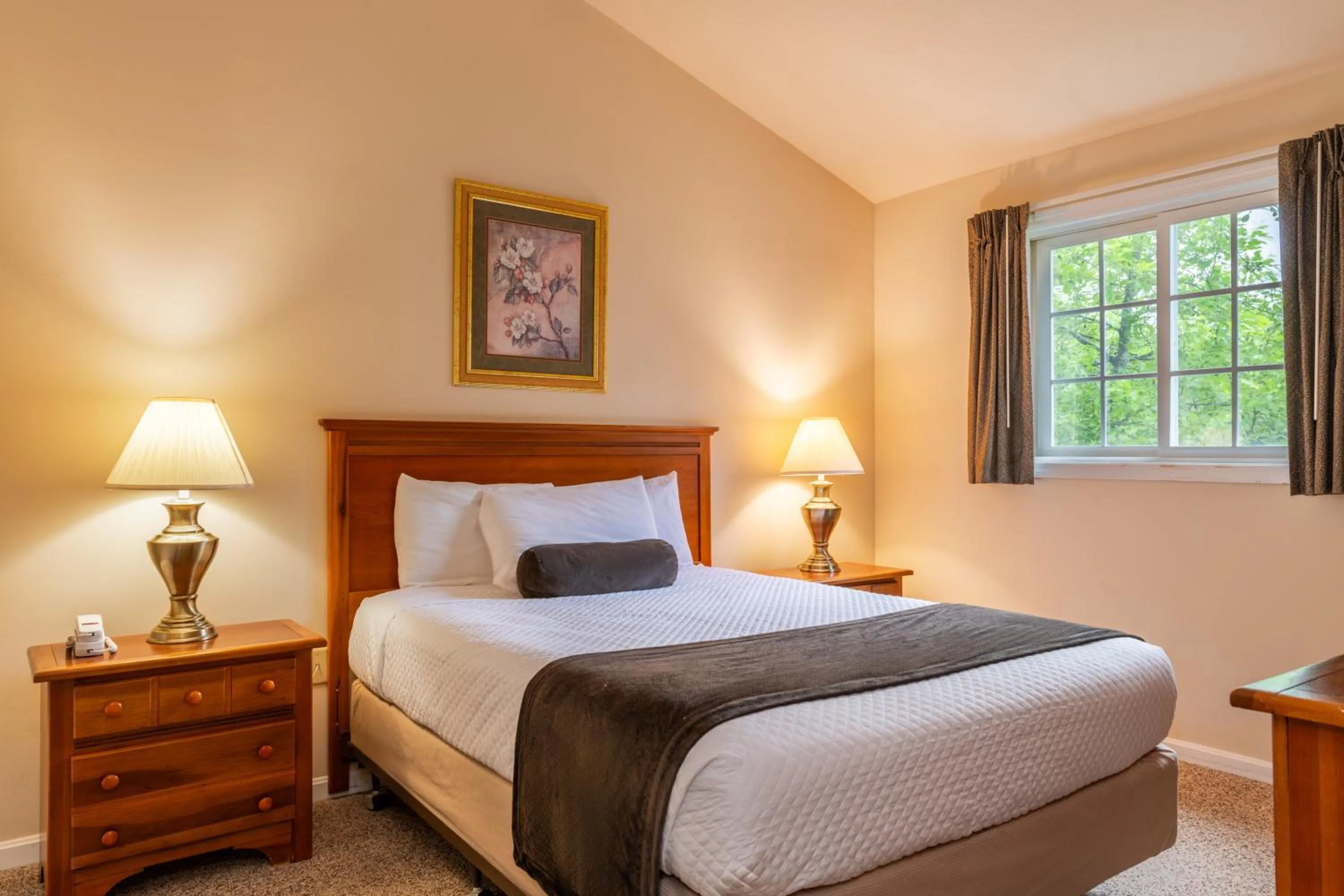 Bed in The Bethel Resort & Suites