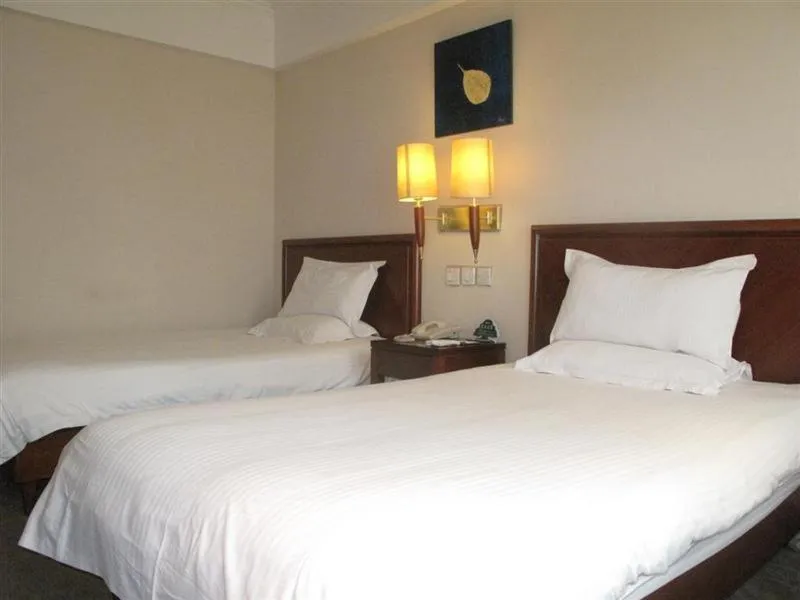 Bed in Greentree Inn Shanghai Chongming Bao Town Express Hotel