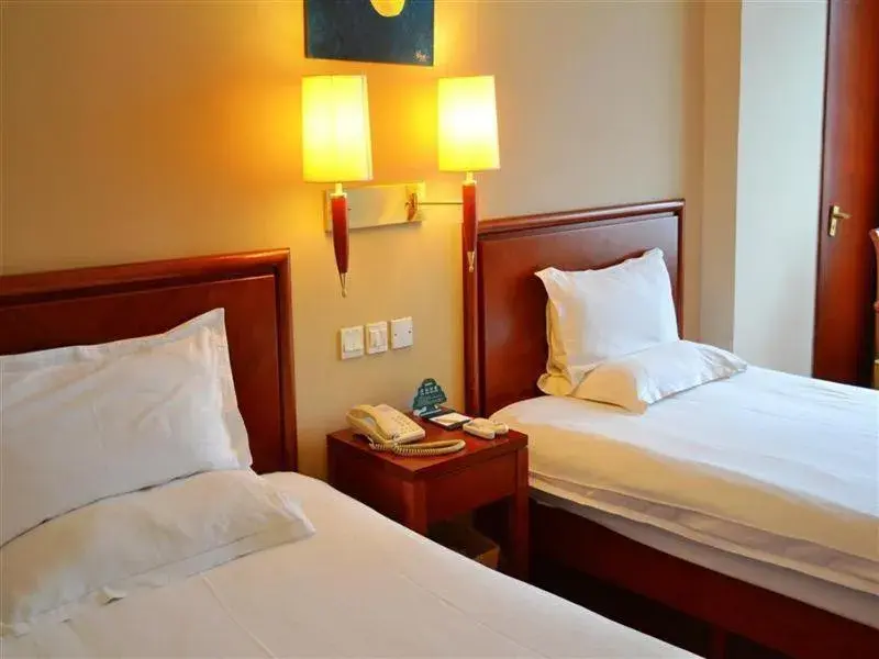 Bed in Greentree Inn Shanghai Chongming Bao Town Express Hotel Bed in Greentree Inn Shanghai Chongming Bao Town Express Hotel