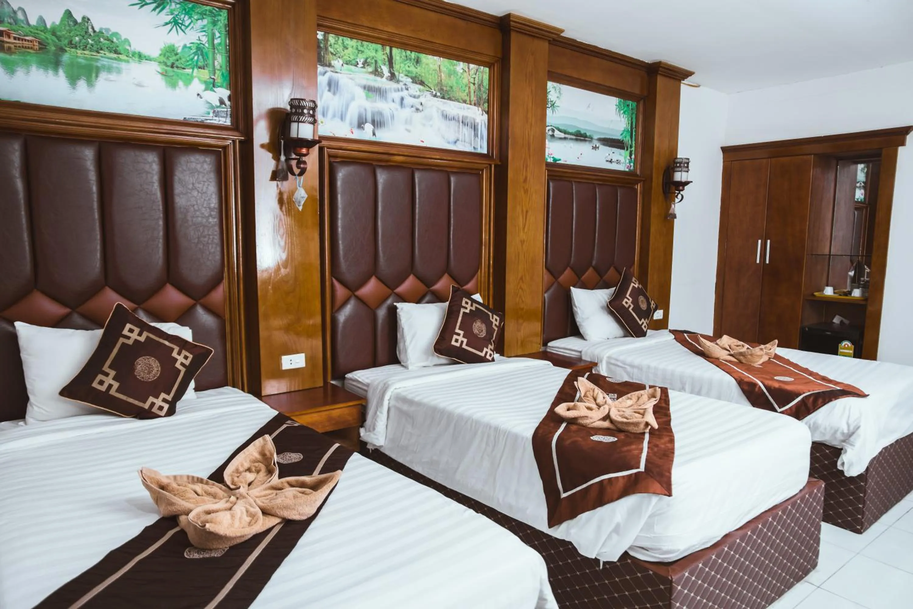 Bed in Vientiane Garden Villa Hotel