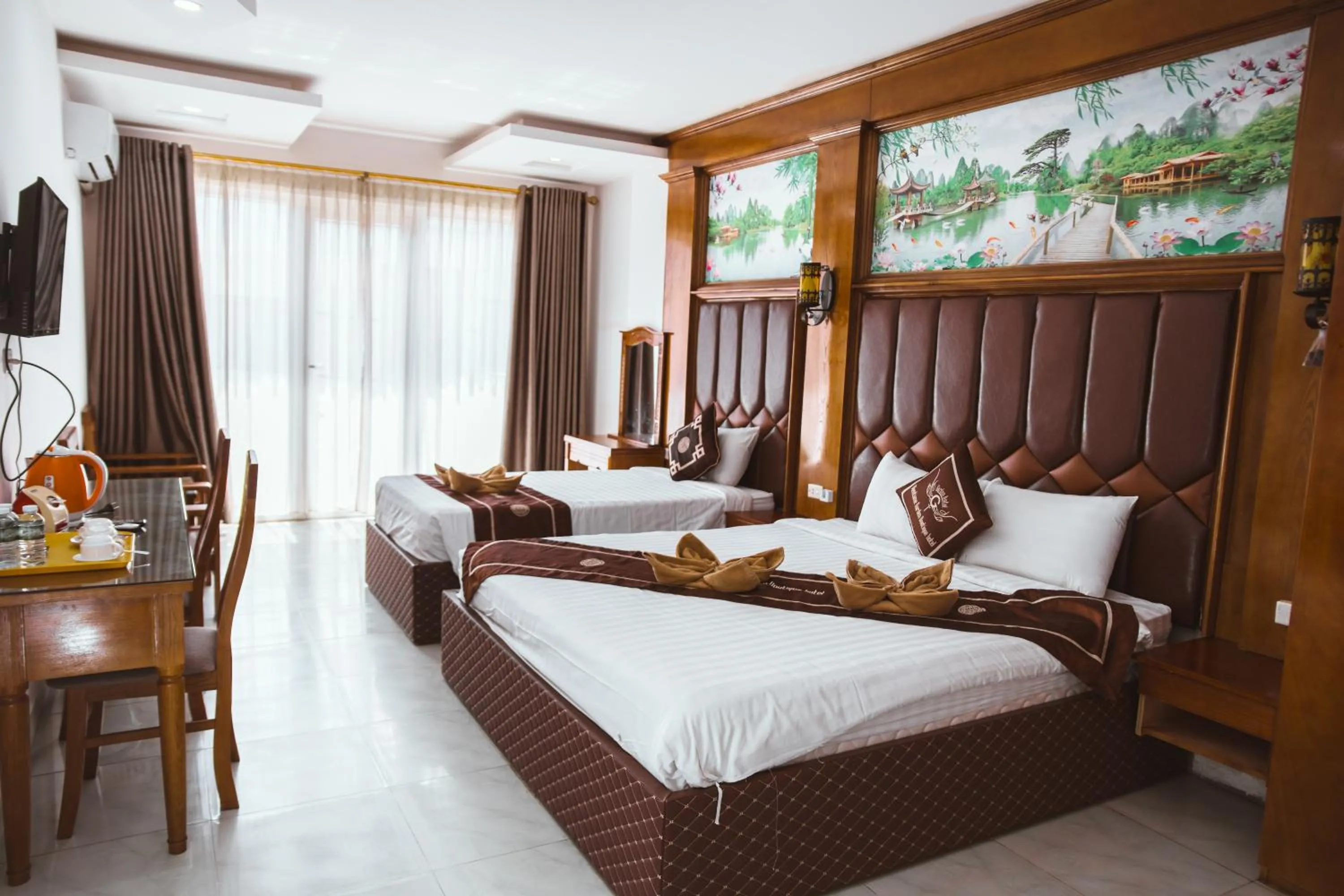 Bed in Vientiane Garden Villa Hotel