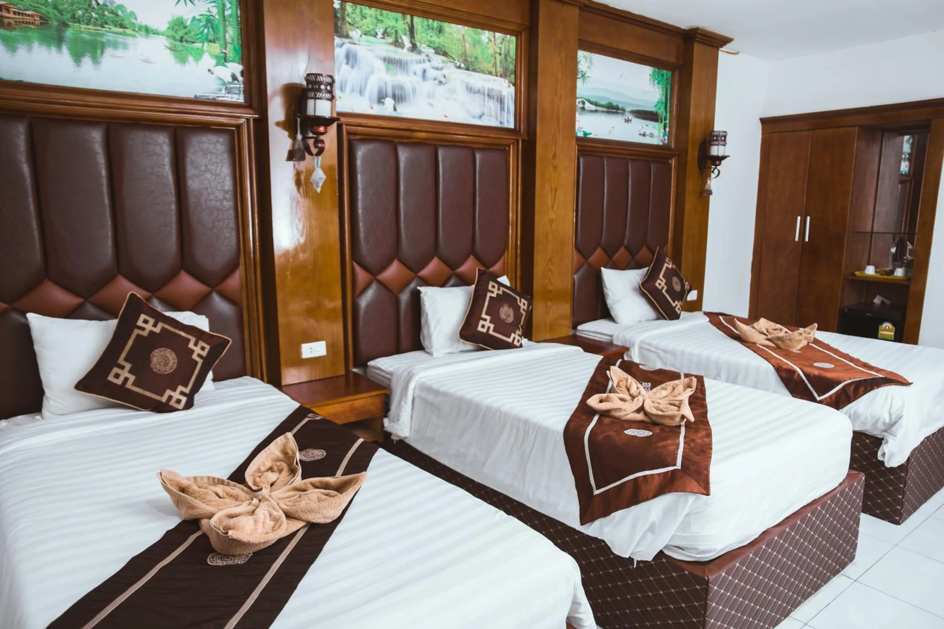 Bed in Vientiane Garden Villa Hotel