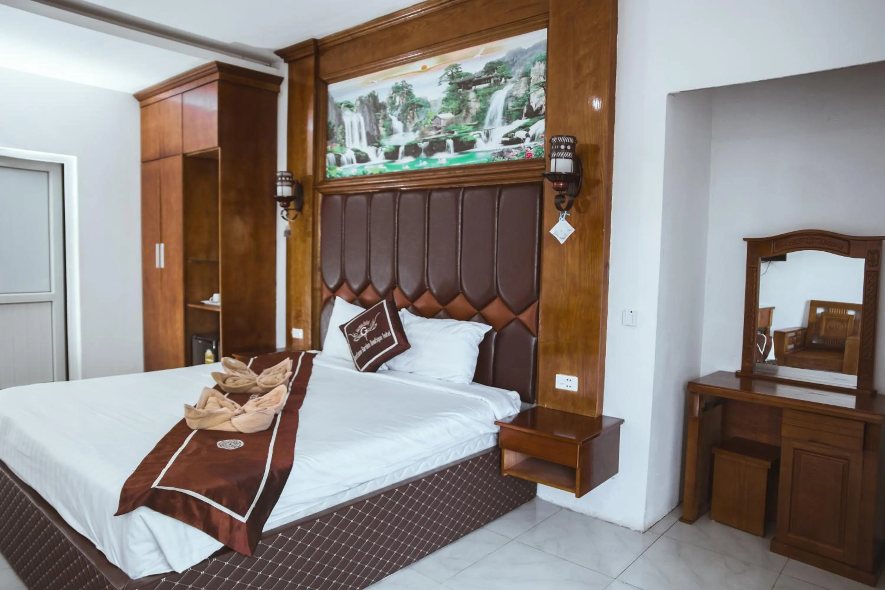 Bed in Vientiane Garden Villa Hotel