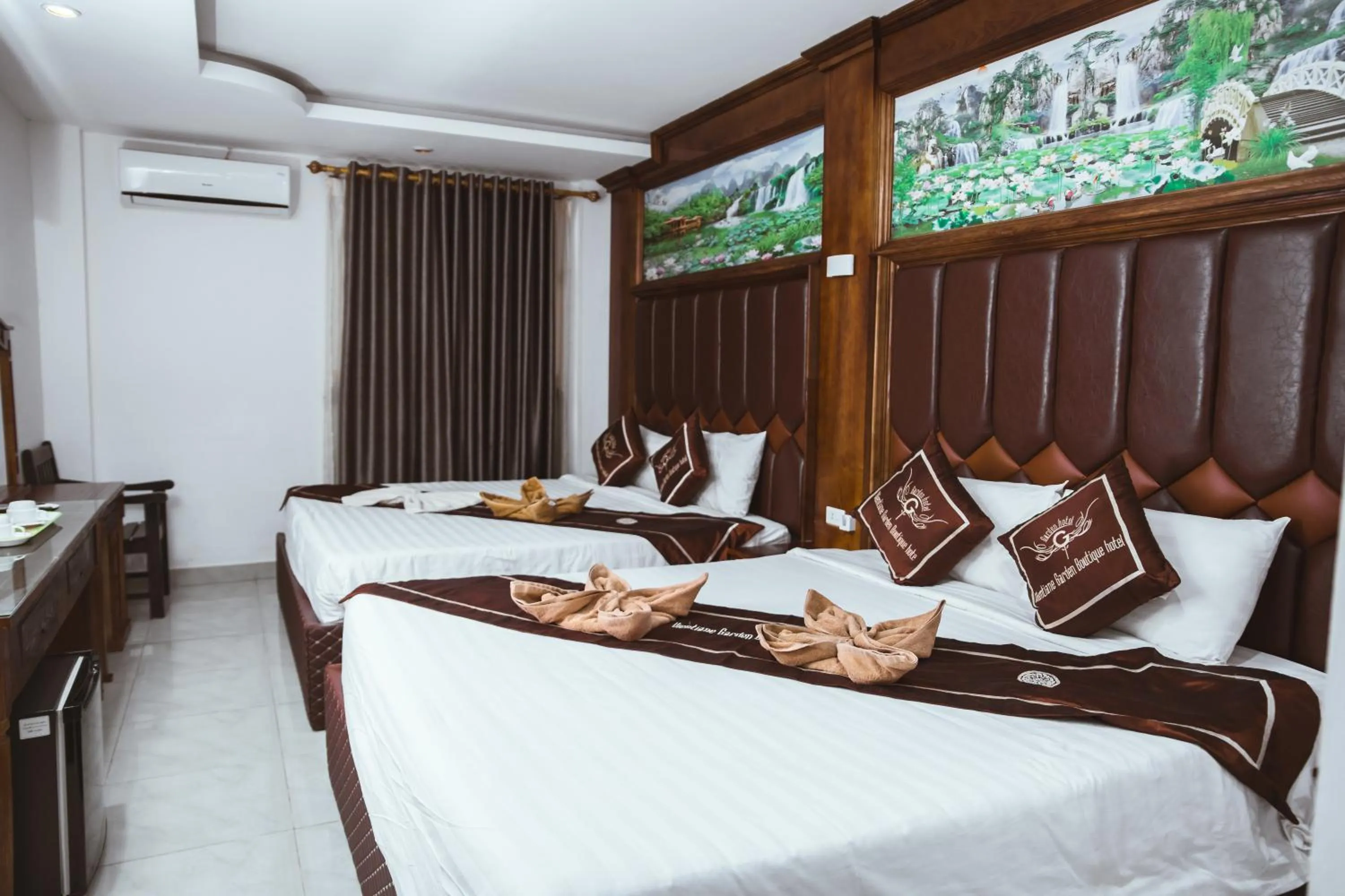Bed in Vientiane Garden Villa Hotel