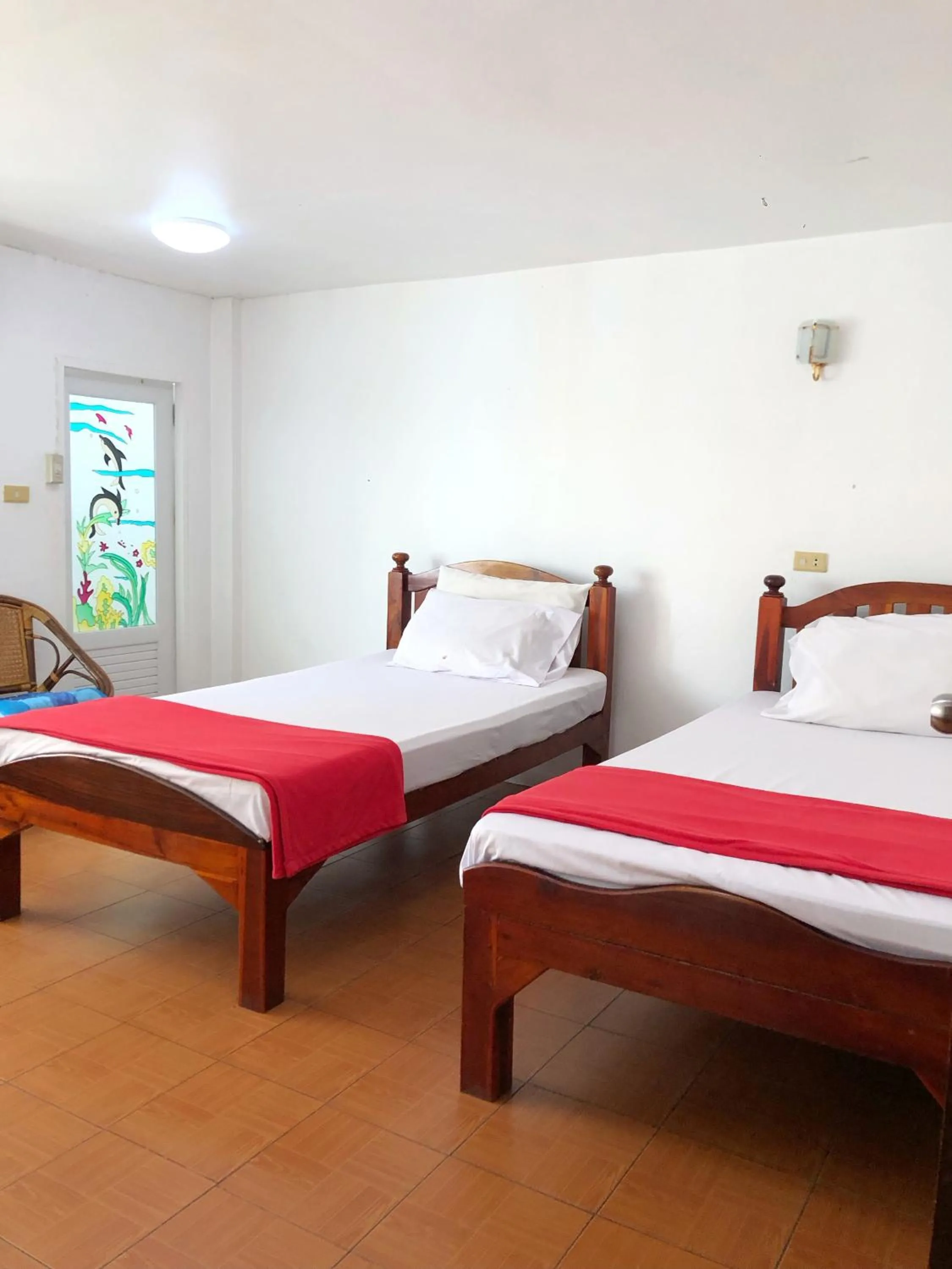 Bed in Moradok Thai Guesthouse