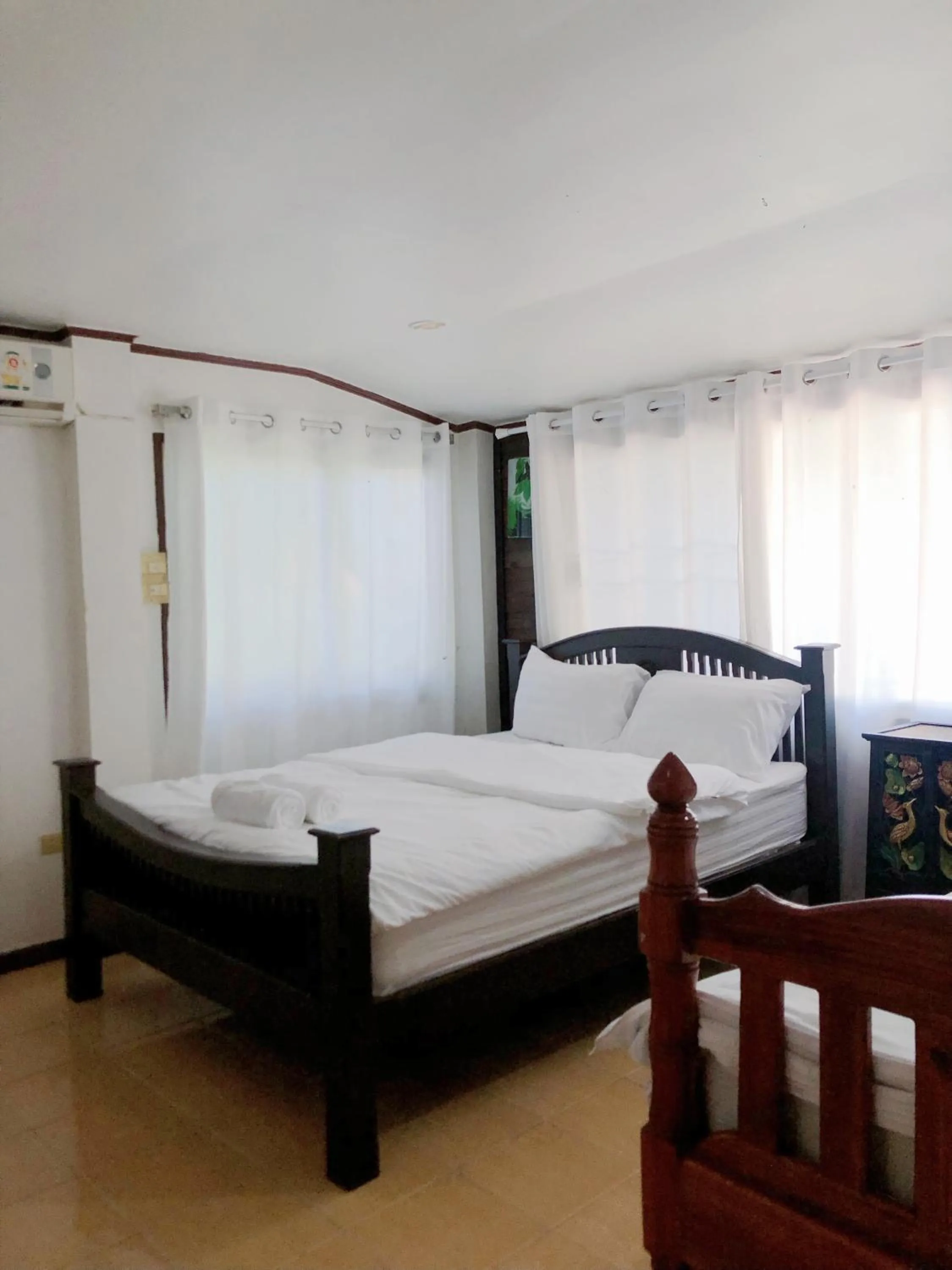 Bed in Moradok Thai Guesthouse