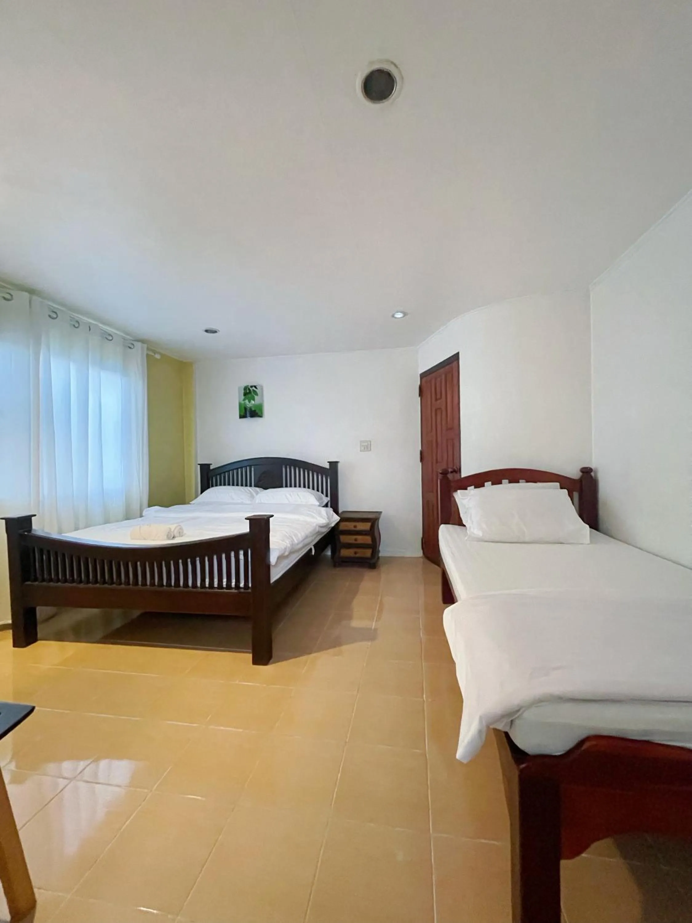 Bed in Moradok Thai Guesthouse