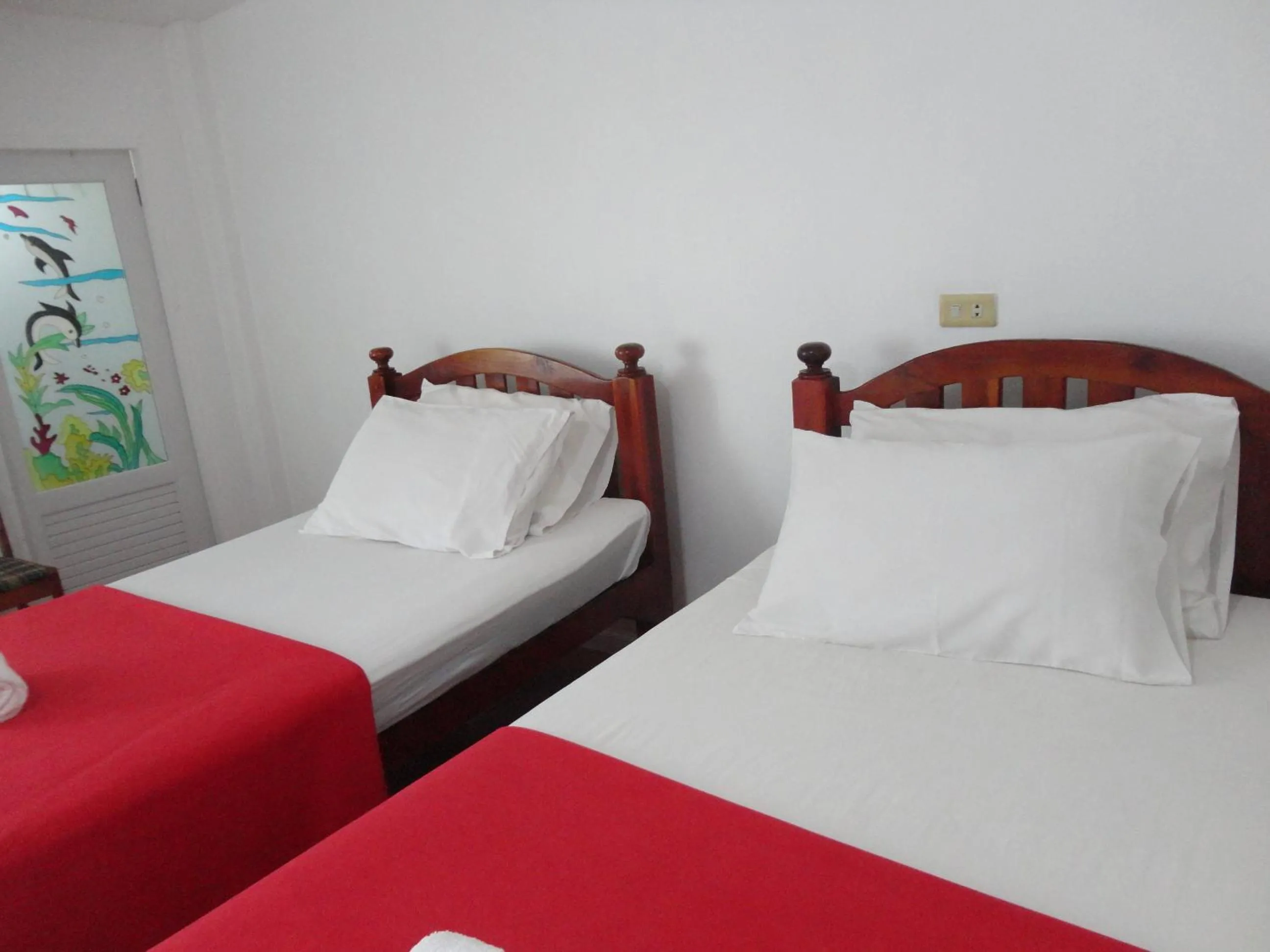Bed in Moradok Thai Guesthouse