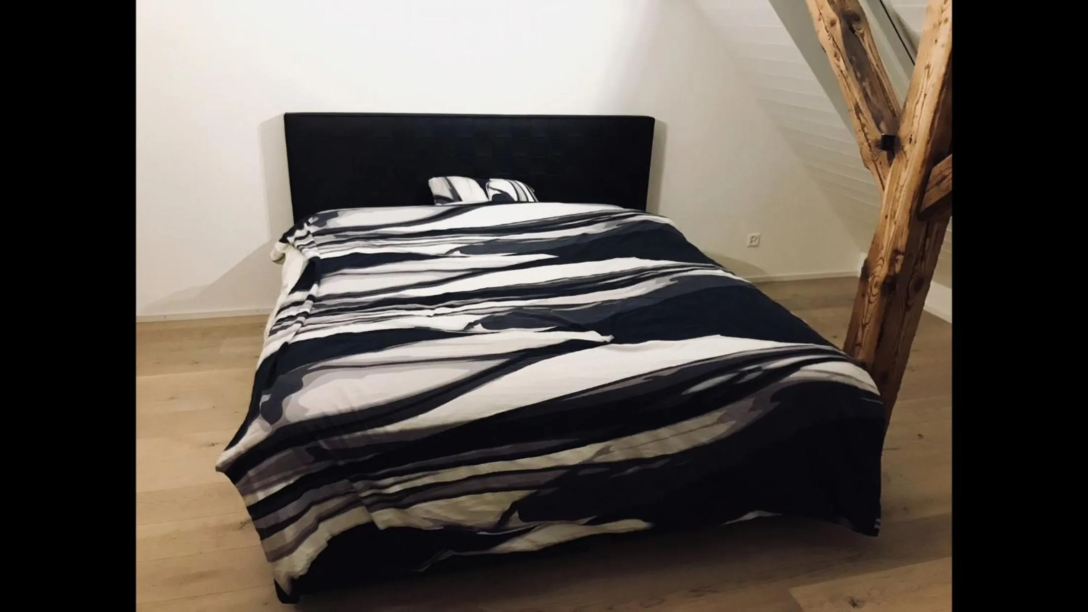 Bed in Luxury Penthouse Apartment