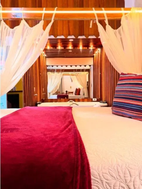 Bed in Chalés Recanto da cachoeira