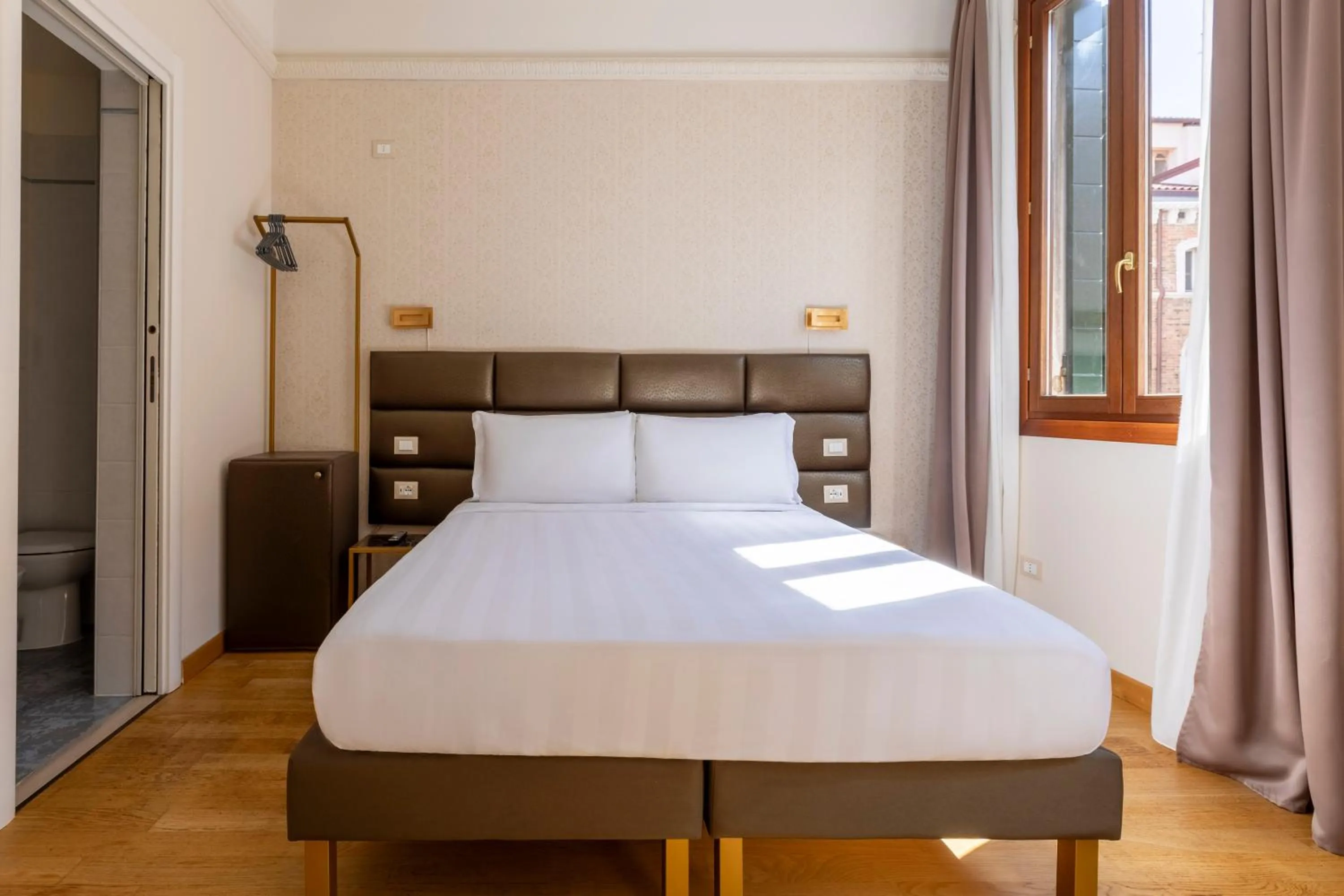 Bed in Numa Venice Palazzo Orseolo