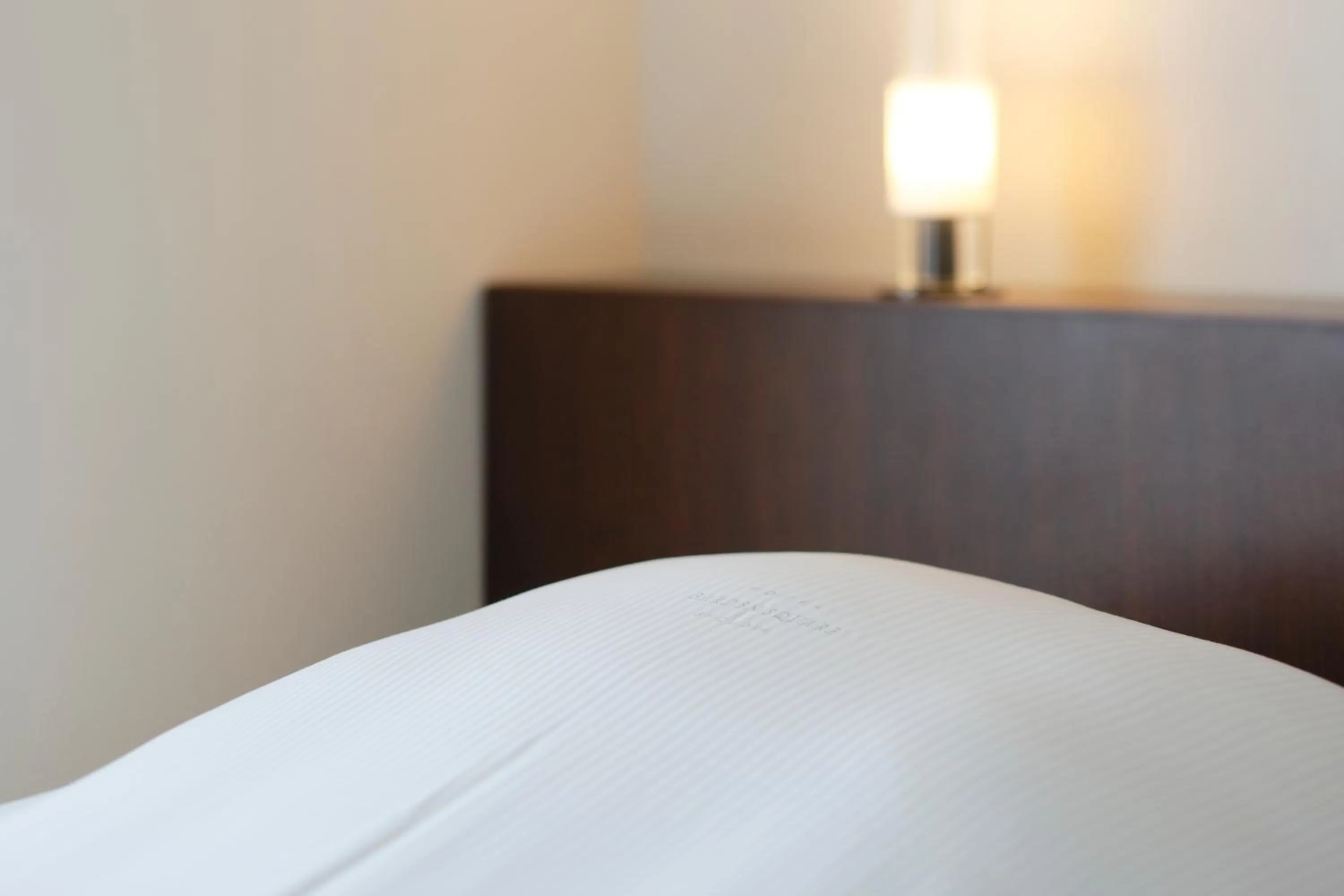 Bed in Hotel Garden Square Shizuoka