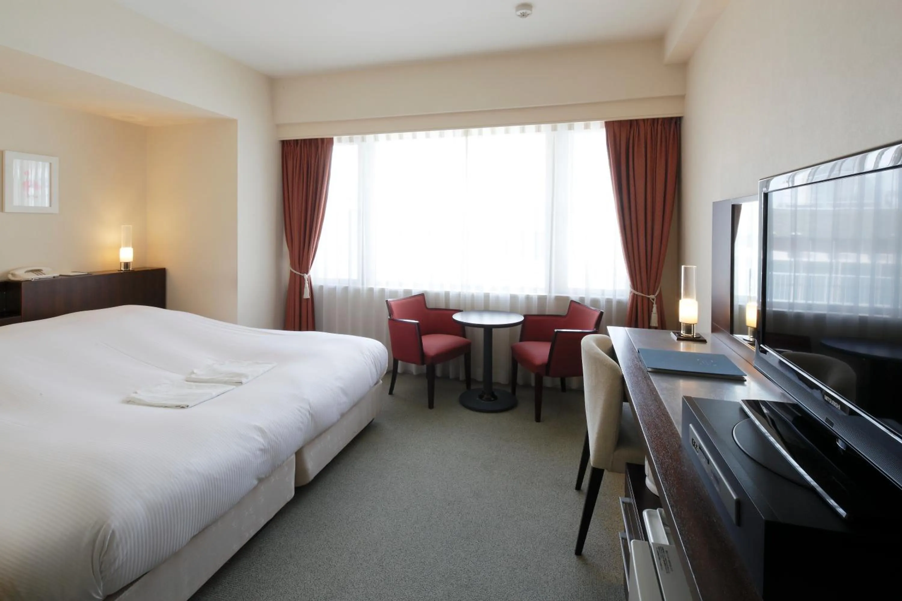 Bed in Hotel Garden Square Shizuoka