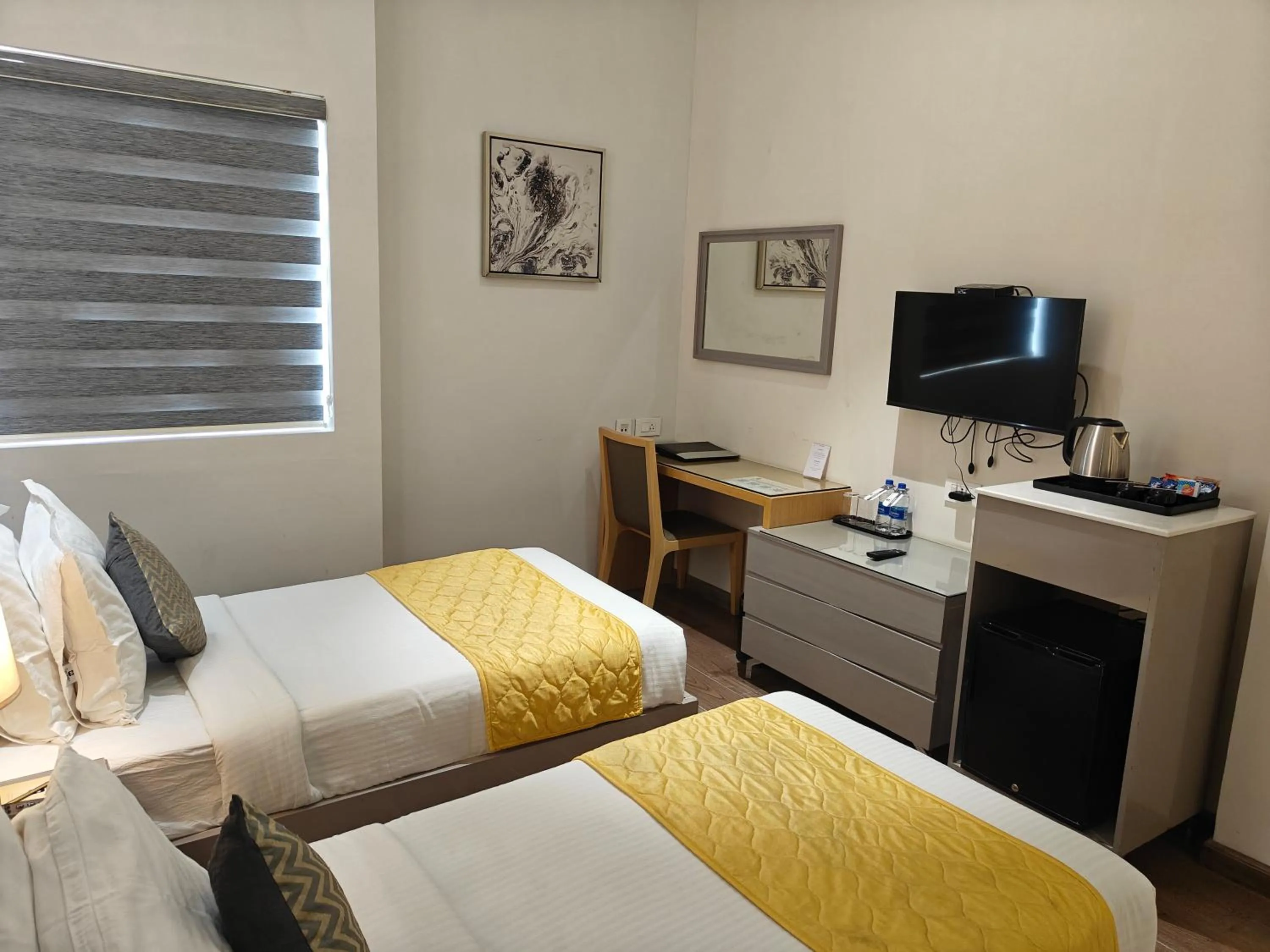 Bed in The Mayberry -A Bergamont Group of Hotels