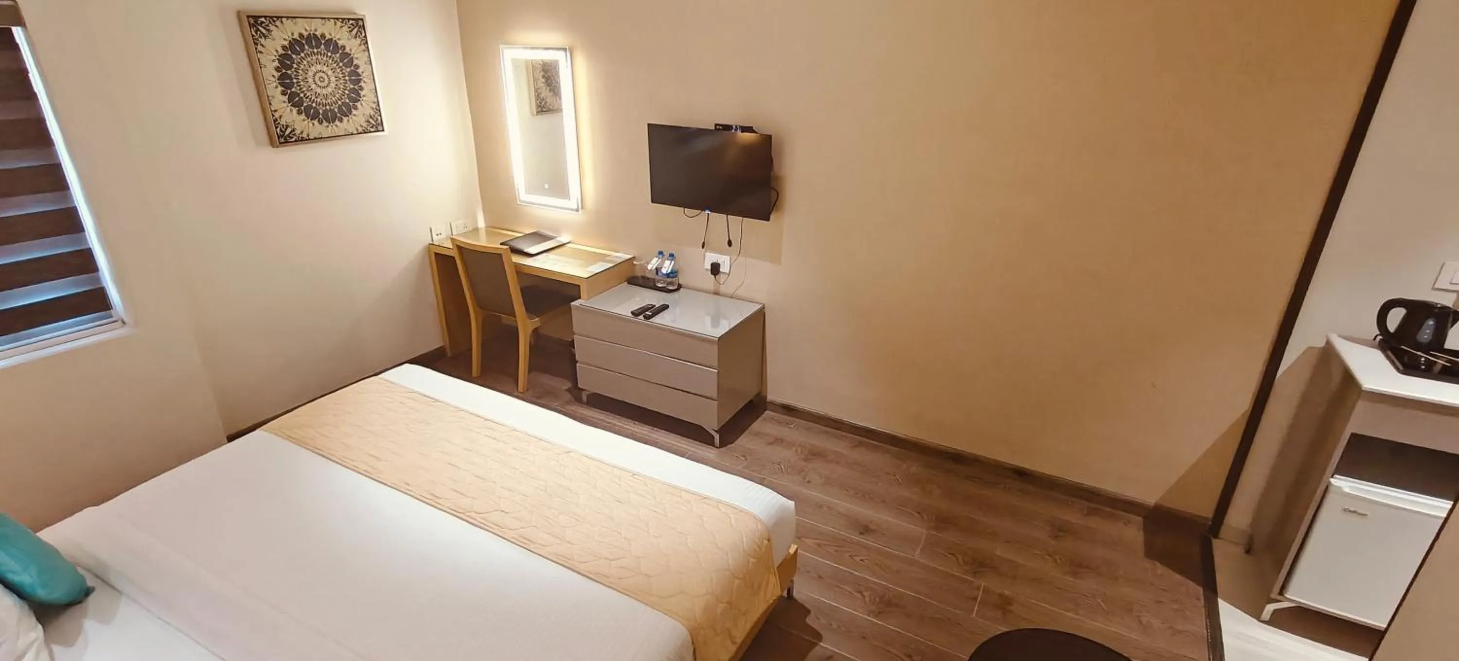 Bed in The Mayberry -A Bergamont Group of Hotels