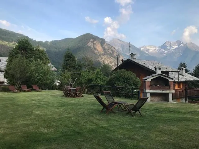 Garden in Aparthotel Foyer d'antan SUITE con caminetto hammam o vasca idromassaggio