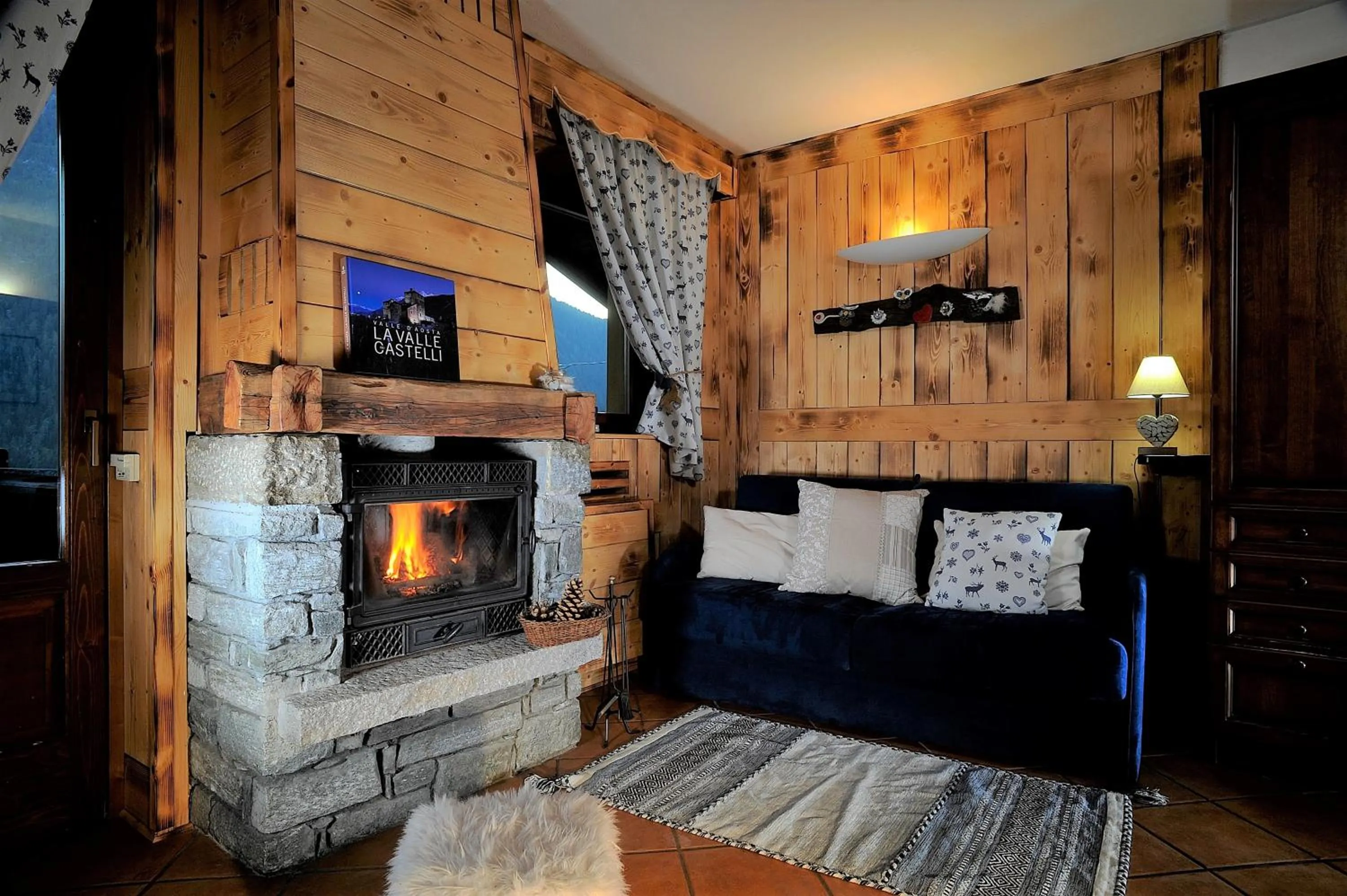 Living room in Aparthotel Foyer d'antan SUITE con caminetto hammam o vasca idromassaggio