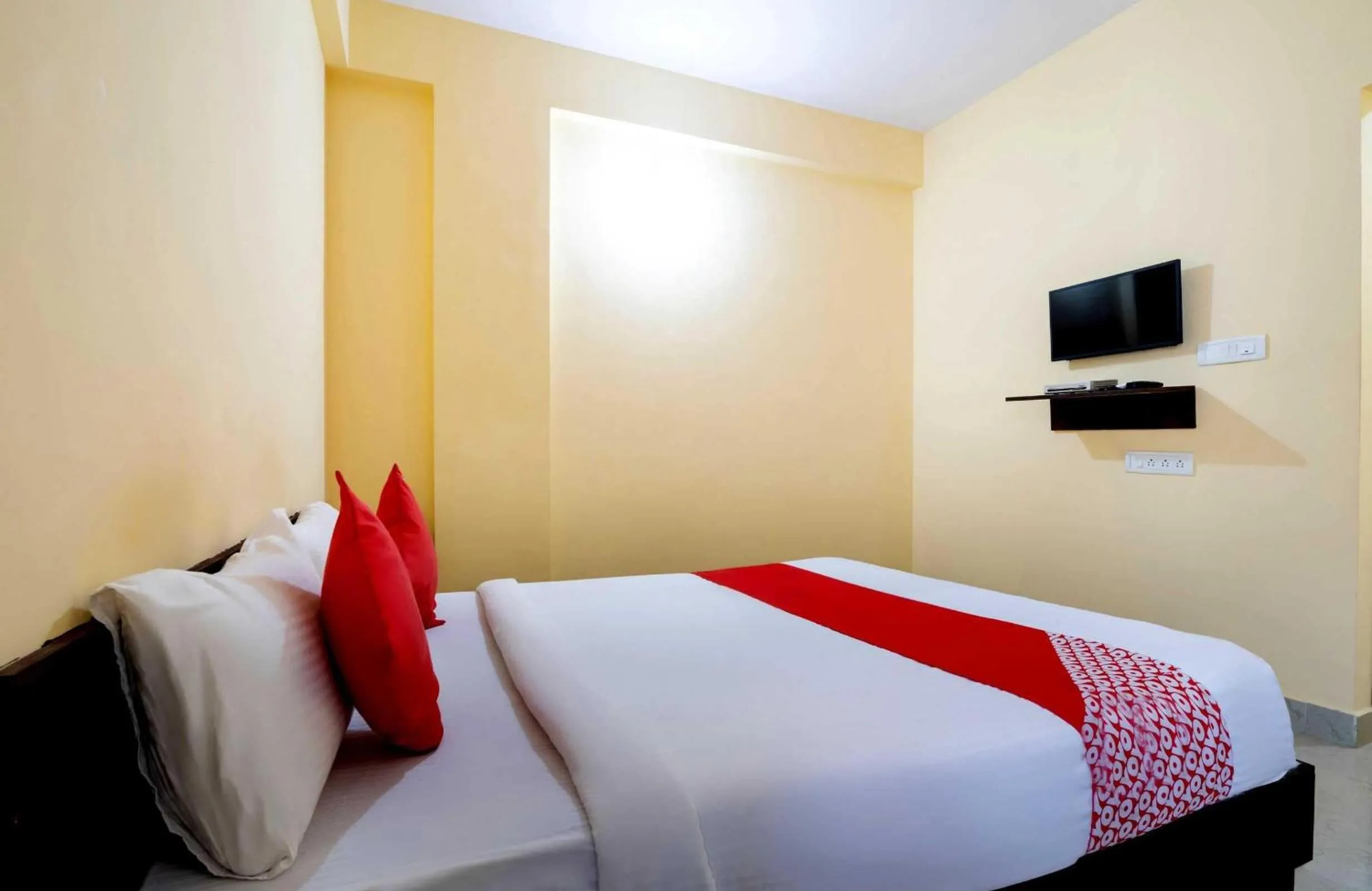 Bedroom in Hotel O Ashraya Comforts