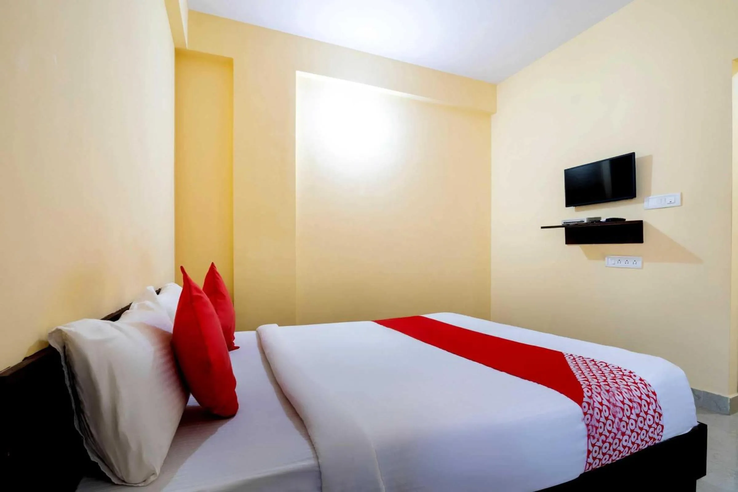 Bedroom in Hotel O Ashraya Comforts