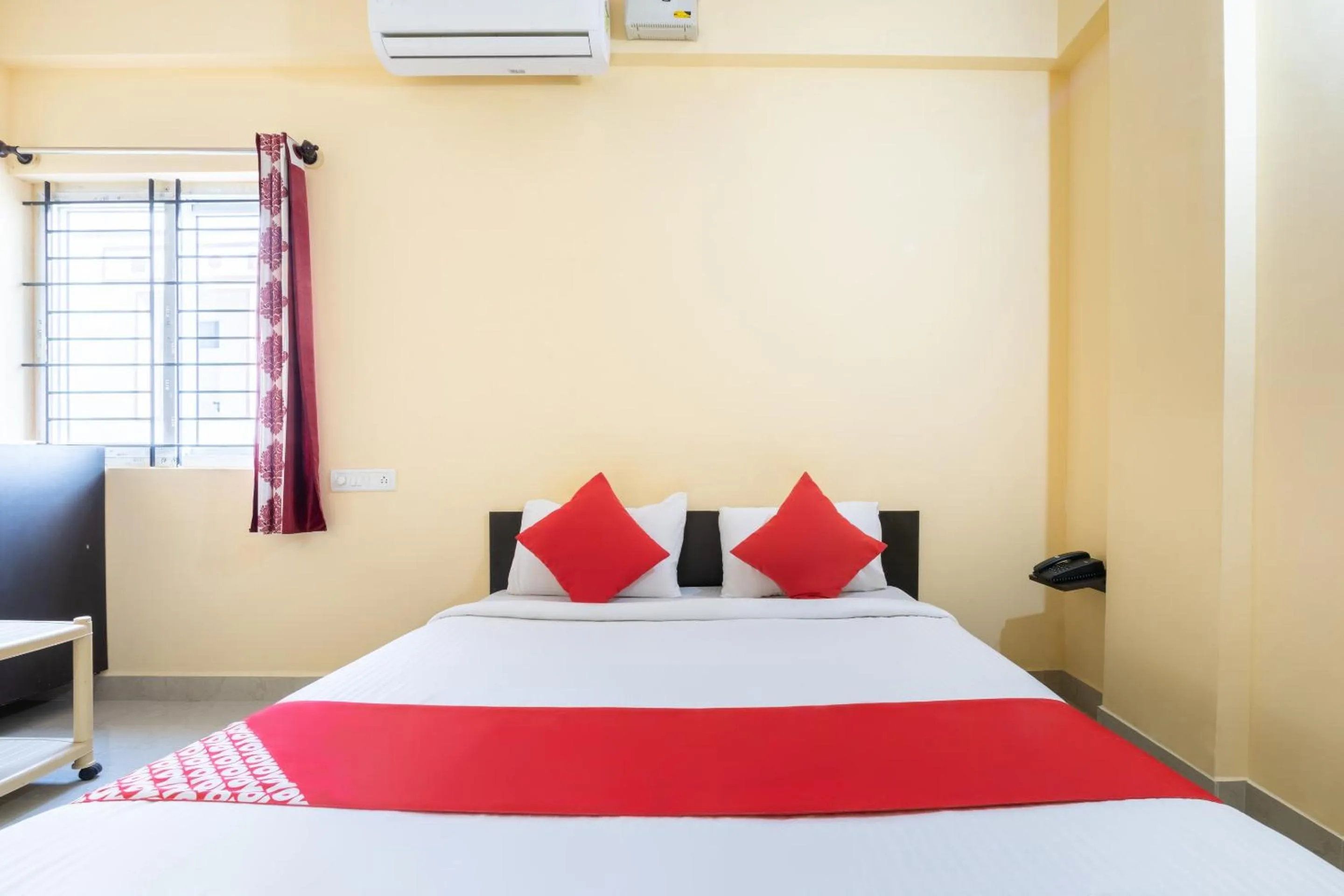 Bedroom in Hotel O Ashraya Comforts