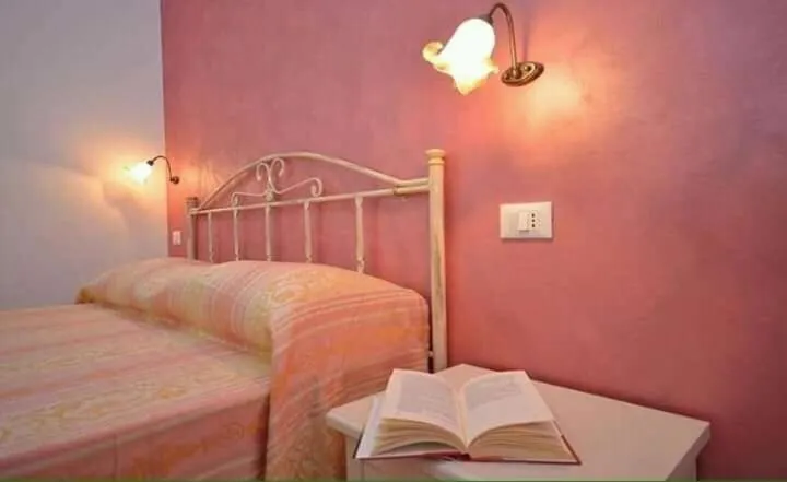 Photo of the whole room in B&B Verso il Faro