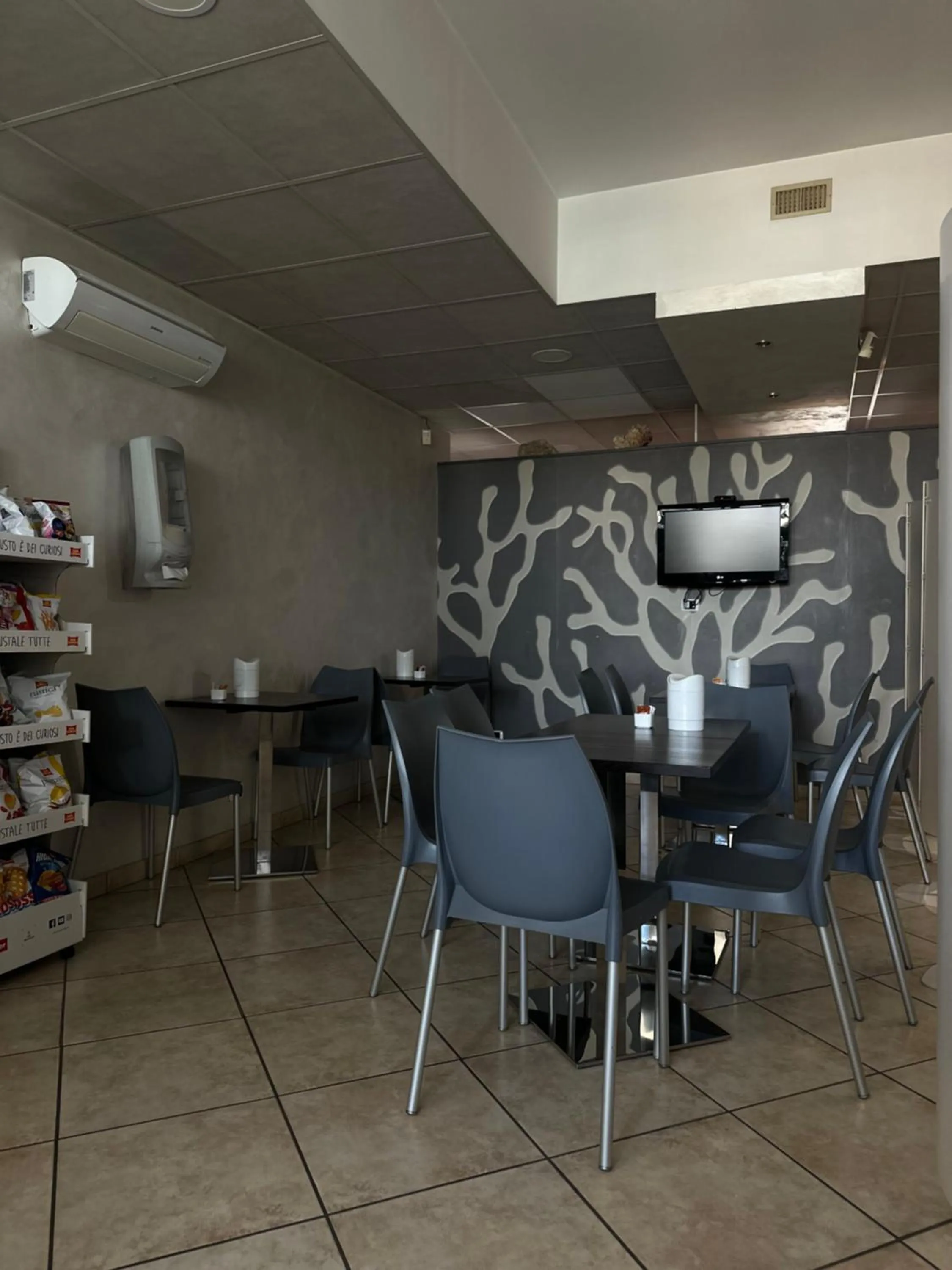 Communal lounge/ TV room in Hotel Il Giardino degli Aranci