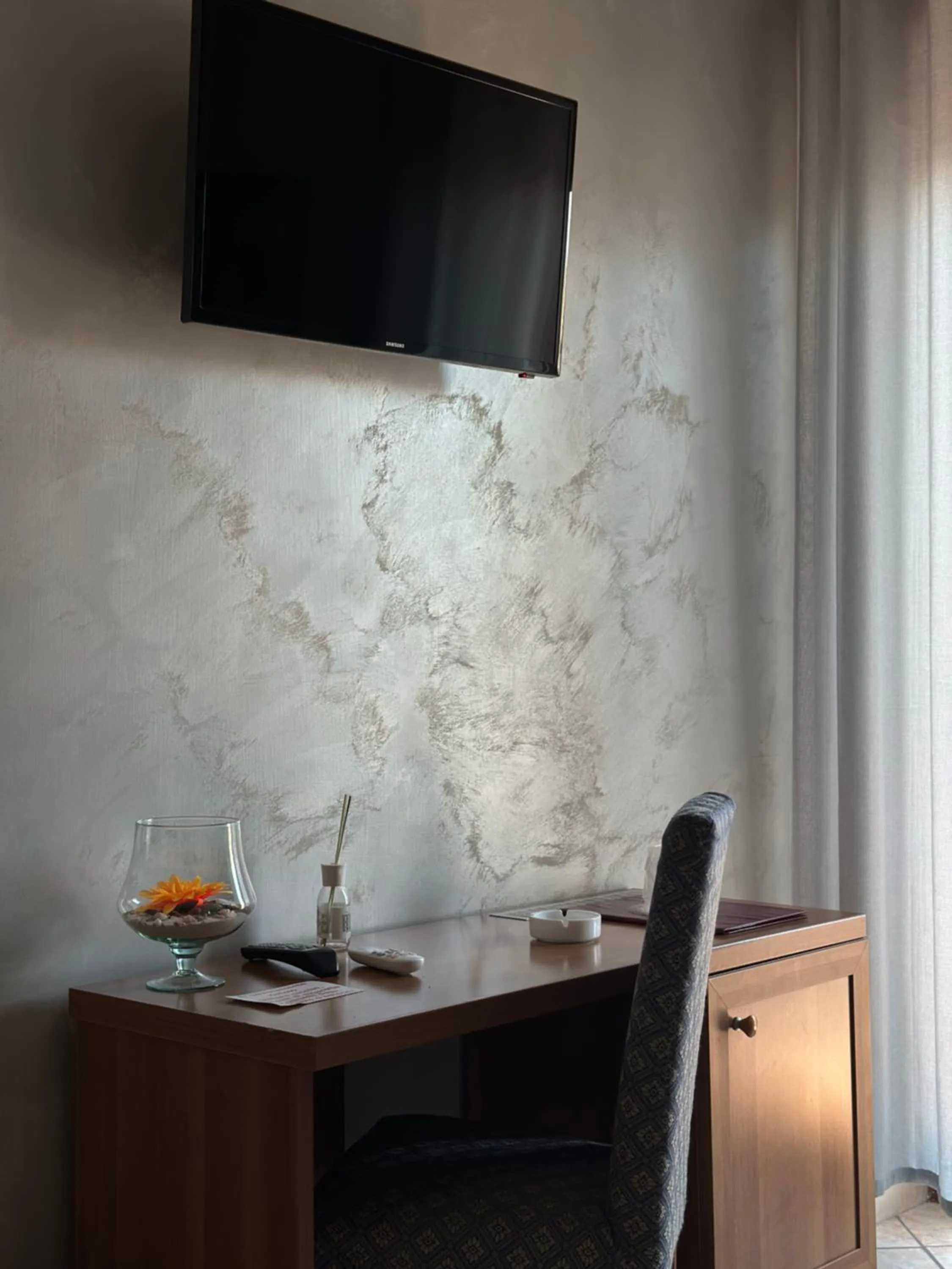 TV and multimedia in Hotel Il Giardino degli Aranci