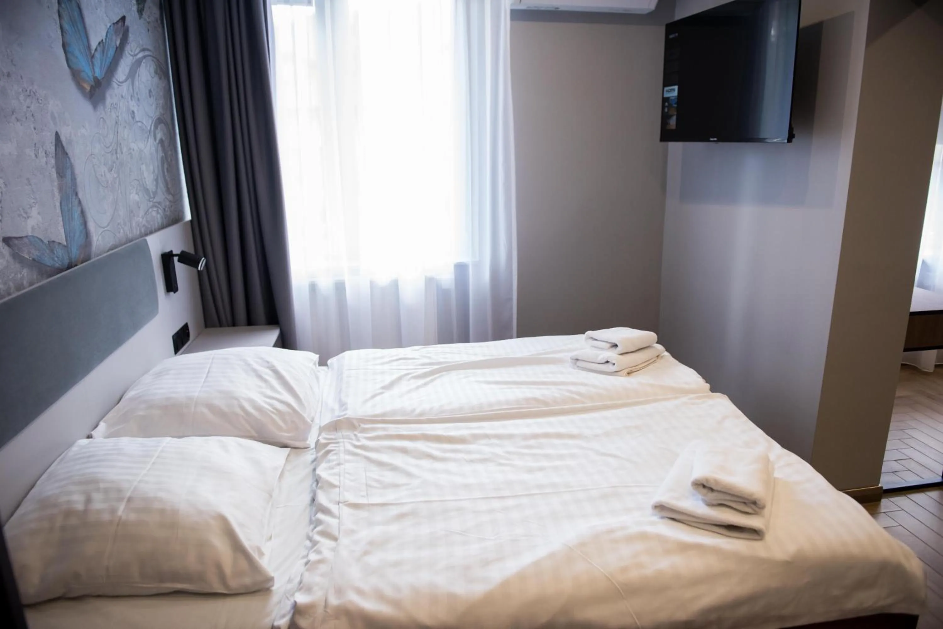 Bed in Hotel Paradiso