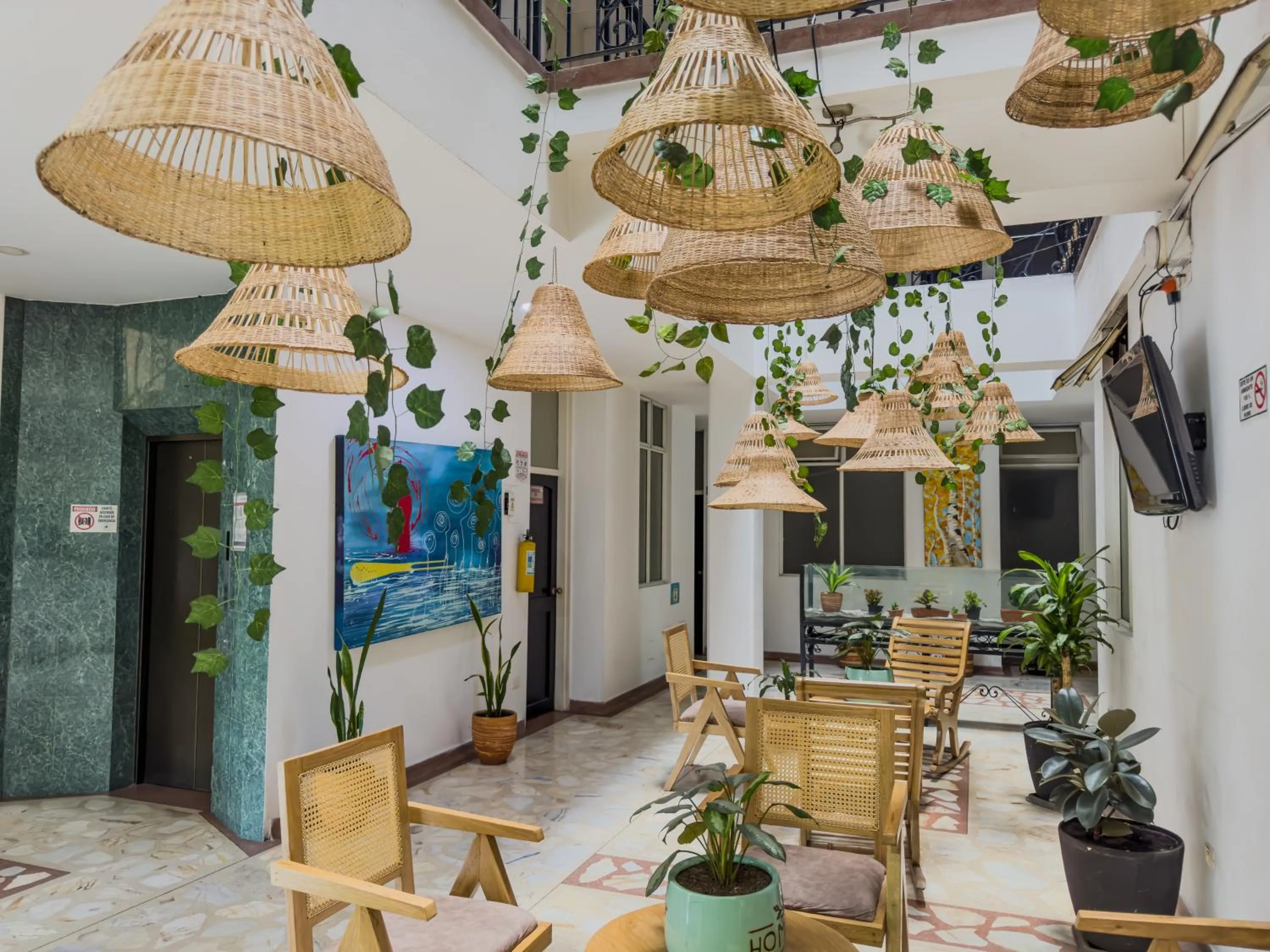 Seating area in Hotel Macedonia Plaza Medellin