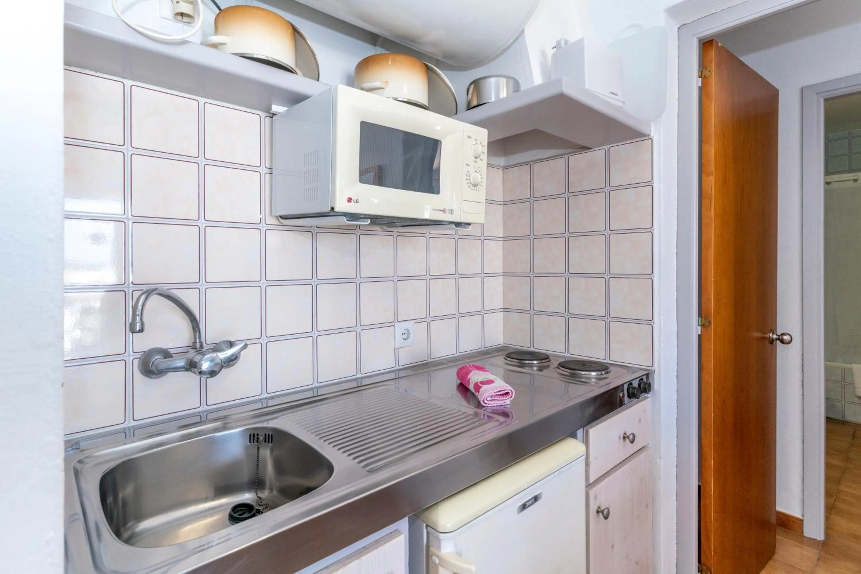 Kitchen or kitchenette in Apartamentos Vista Blanes