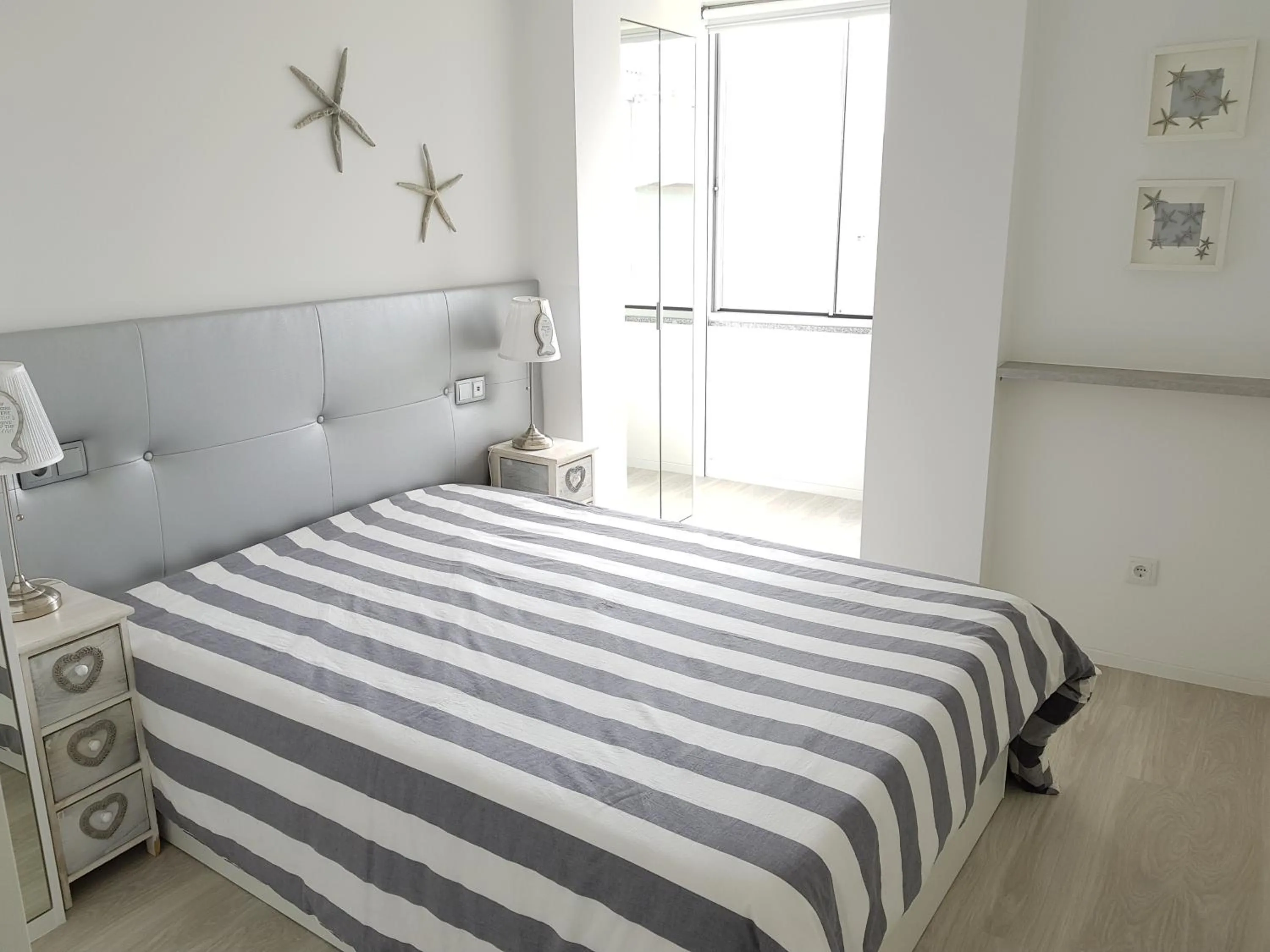 Bed in Blue Sea Apartment