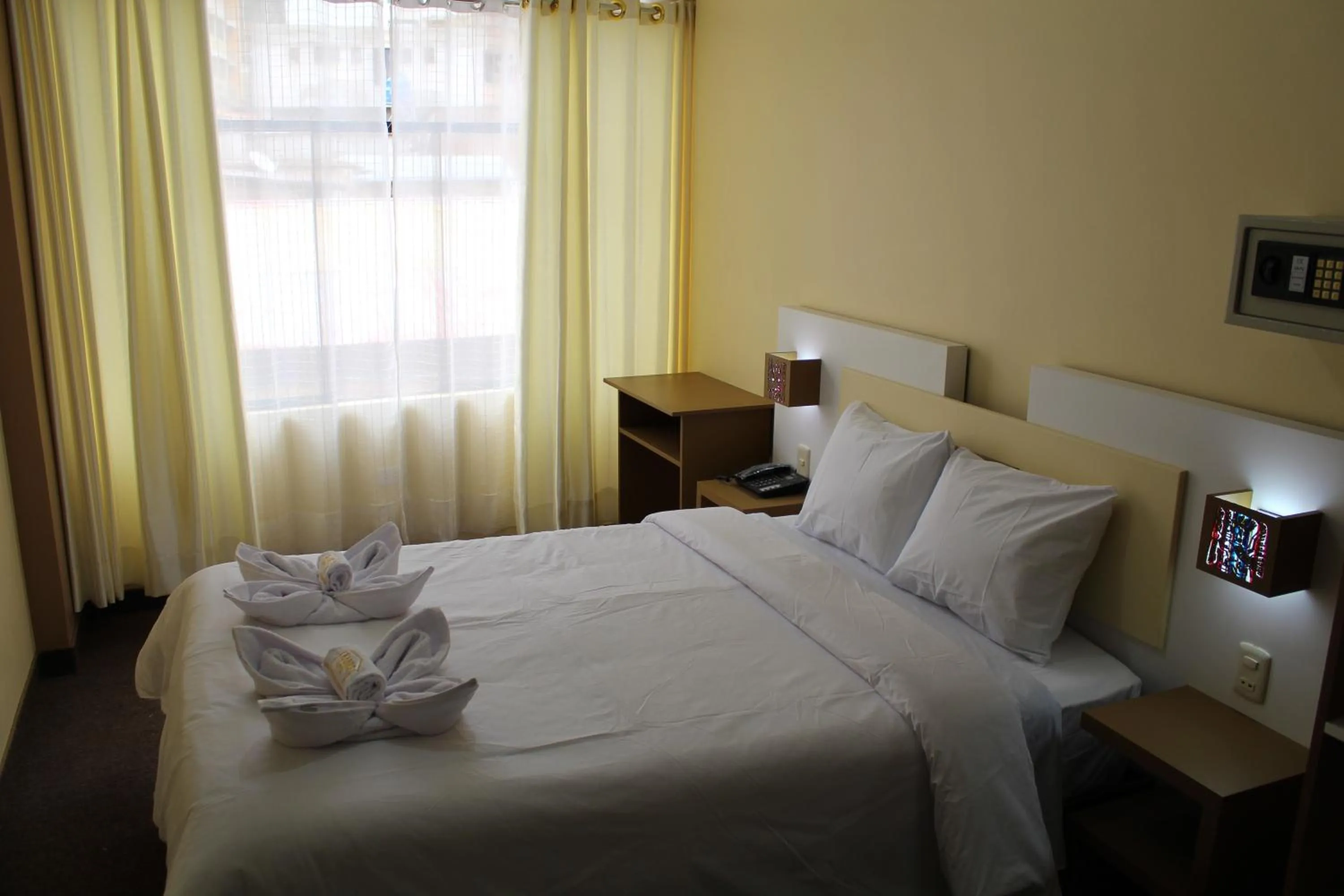 Bed in Kaaro Hotel Puno