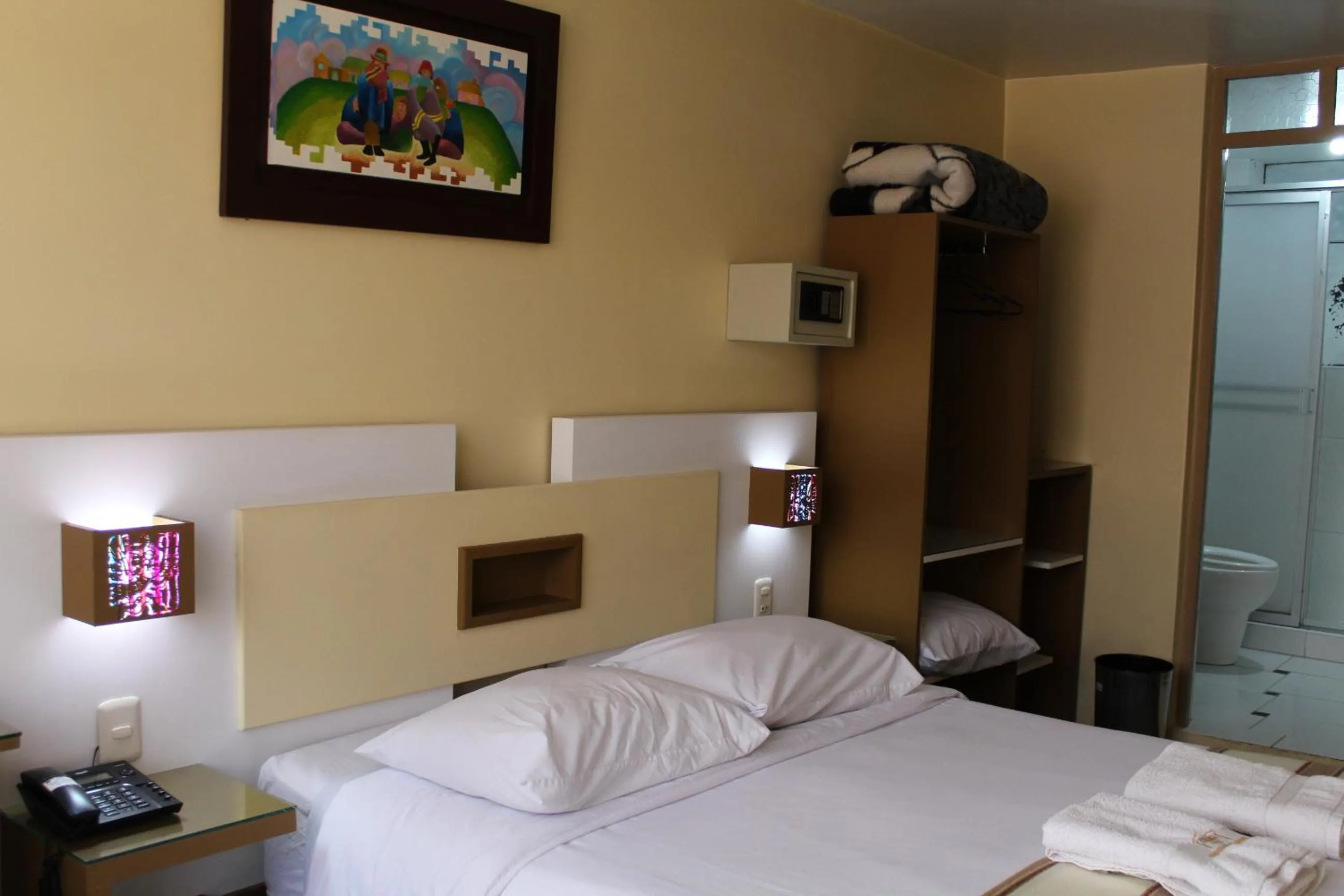 Bed in Kaaro Hotel Puno