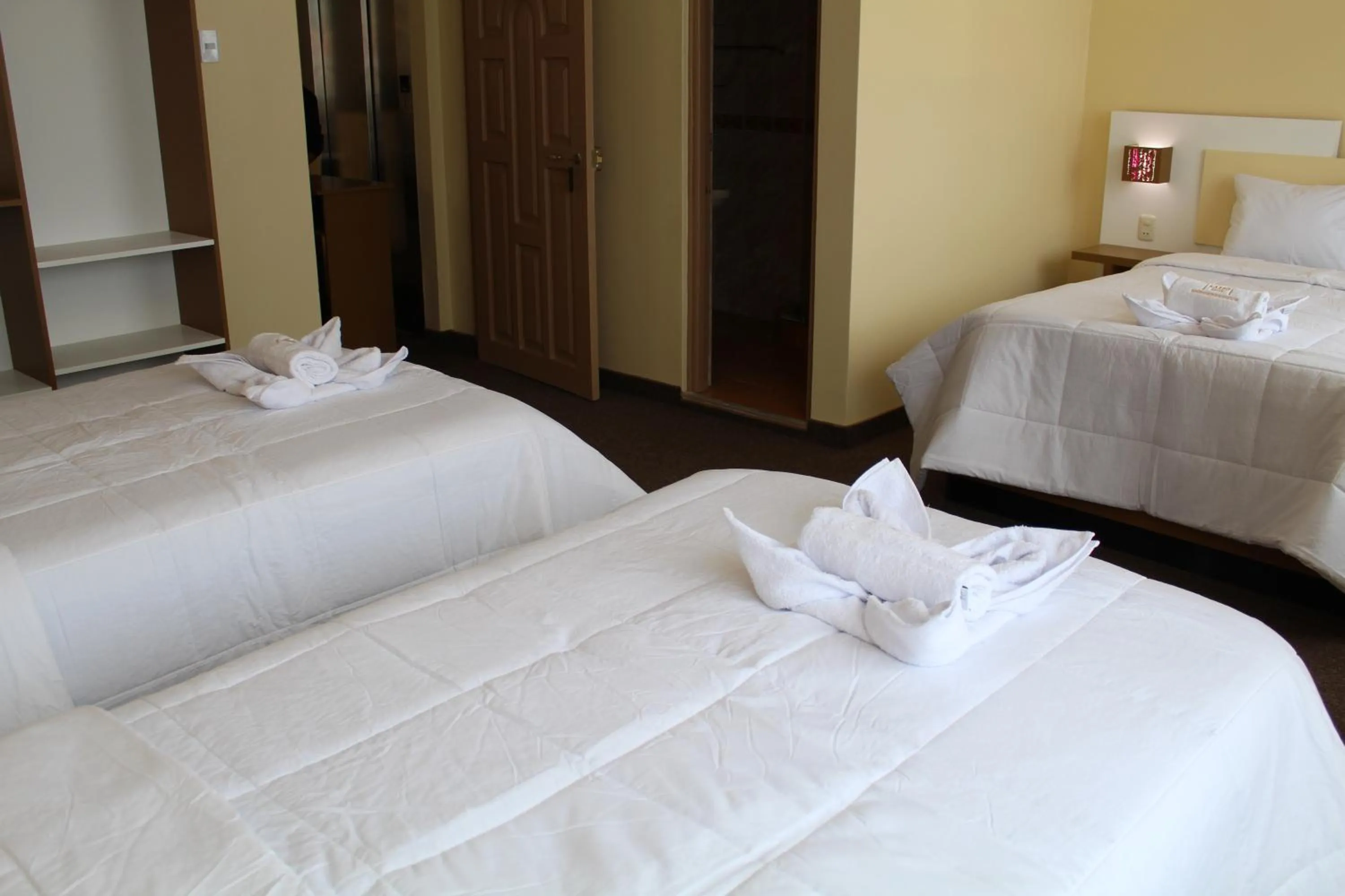 Bed in Kaaro Hotel Puno