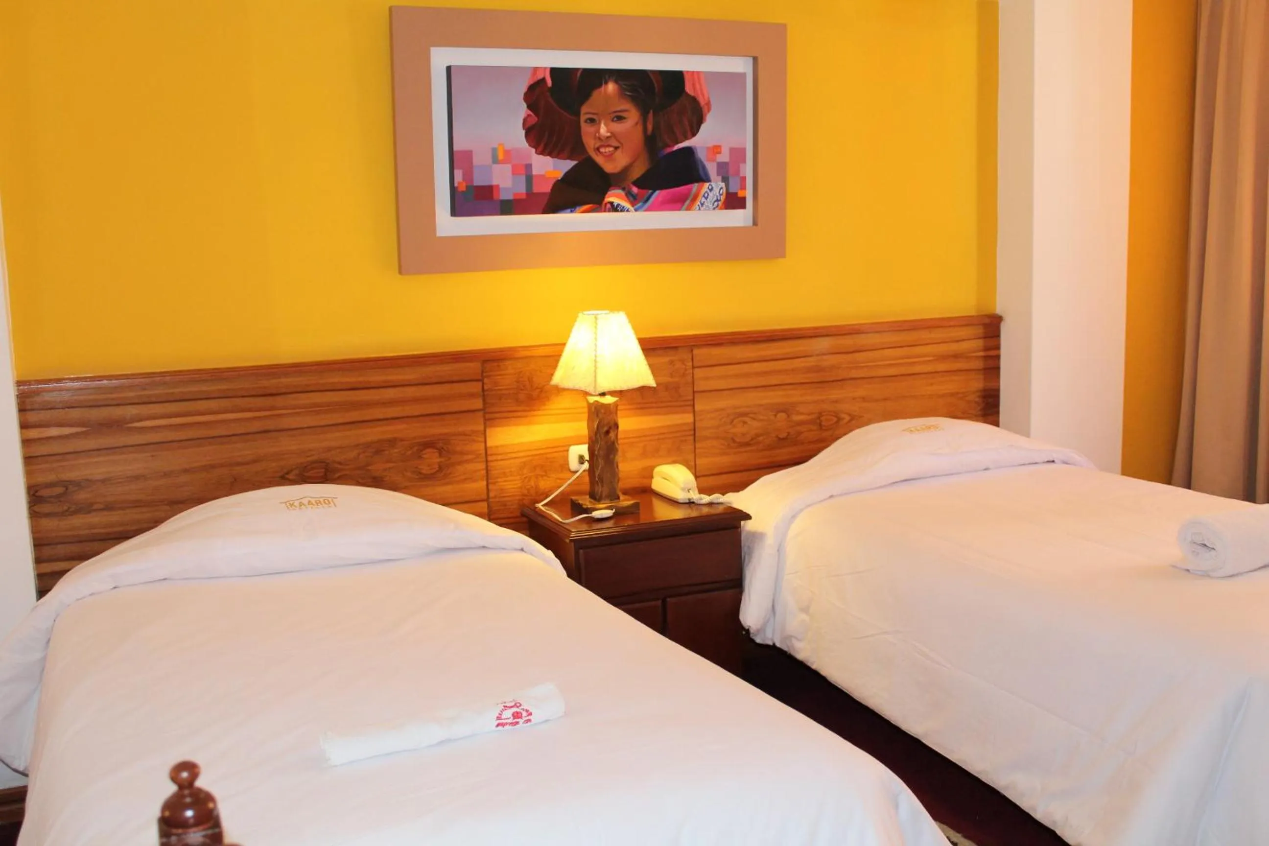 Bed in Kaaro Hotel Puno