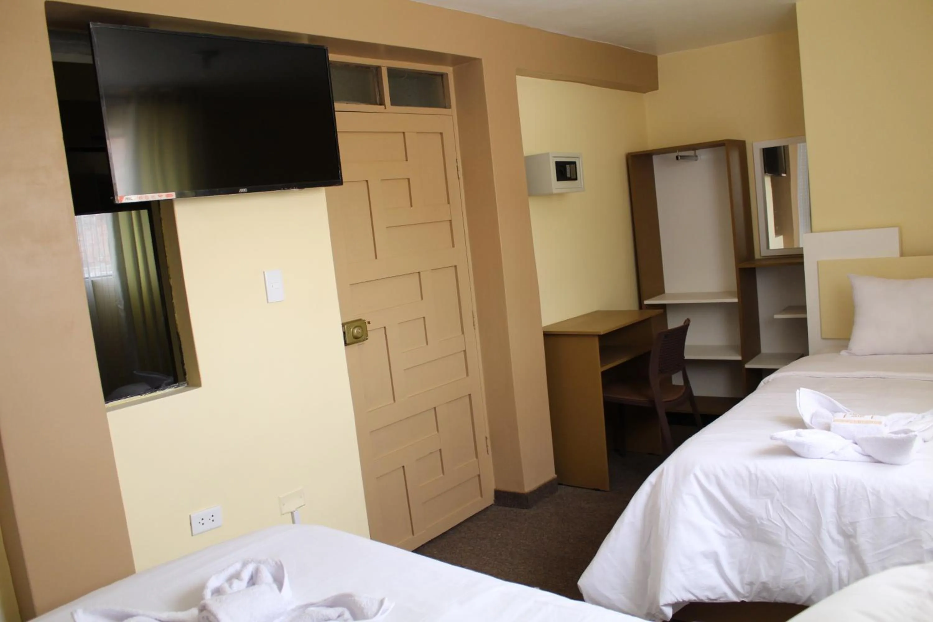 Bed in Kaaro Hotel Puno