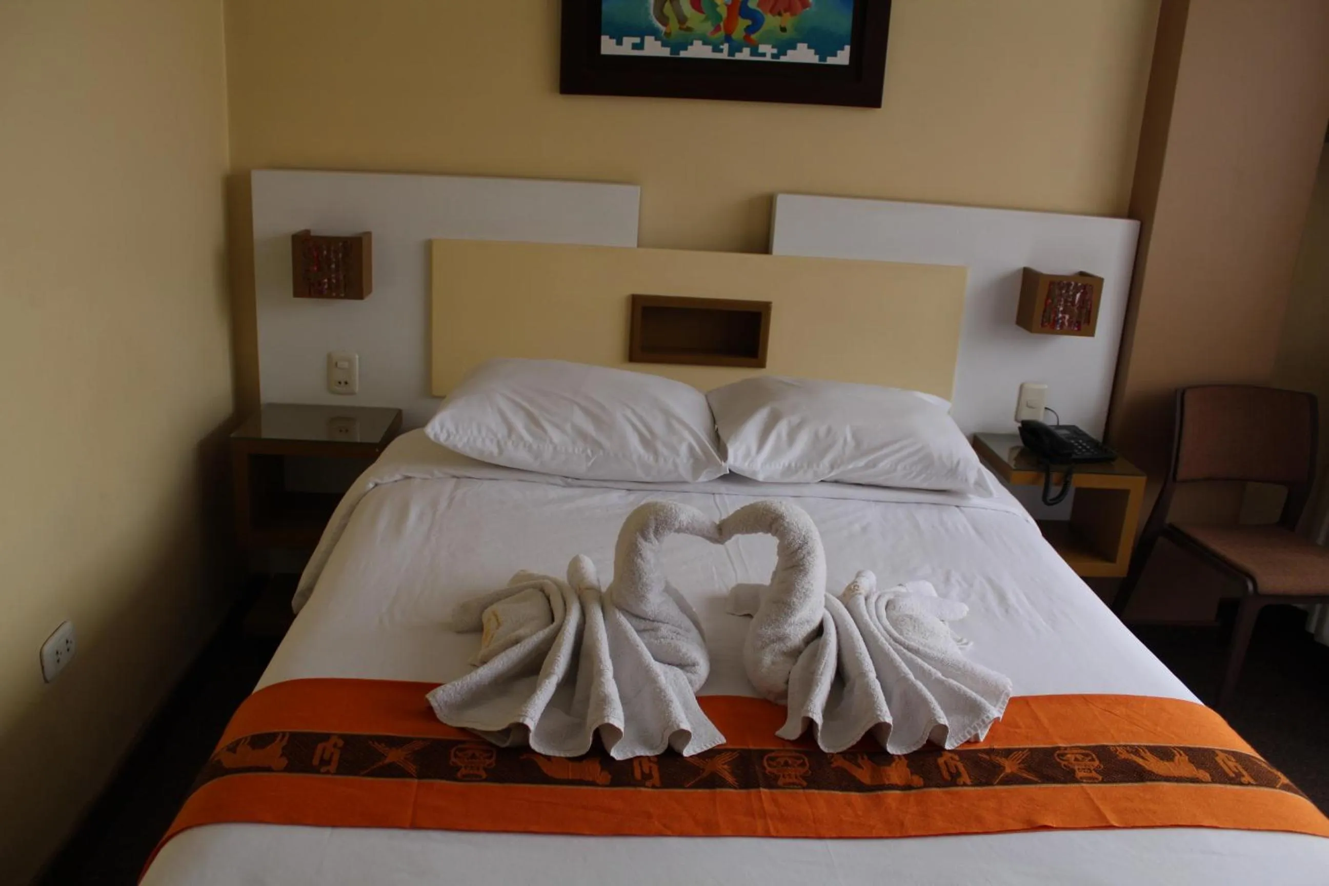 Bed in Kaaro Hotel Puno