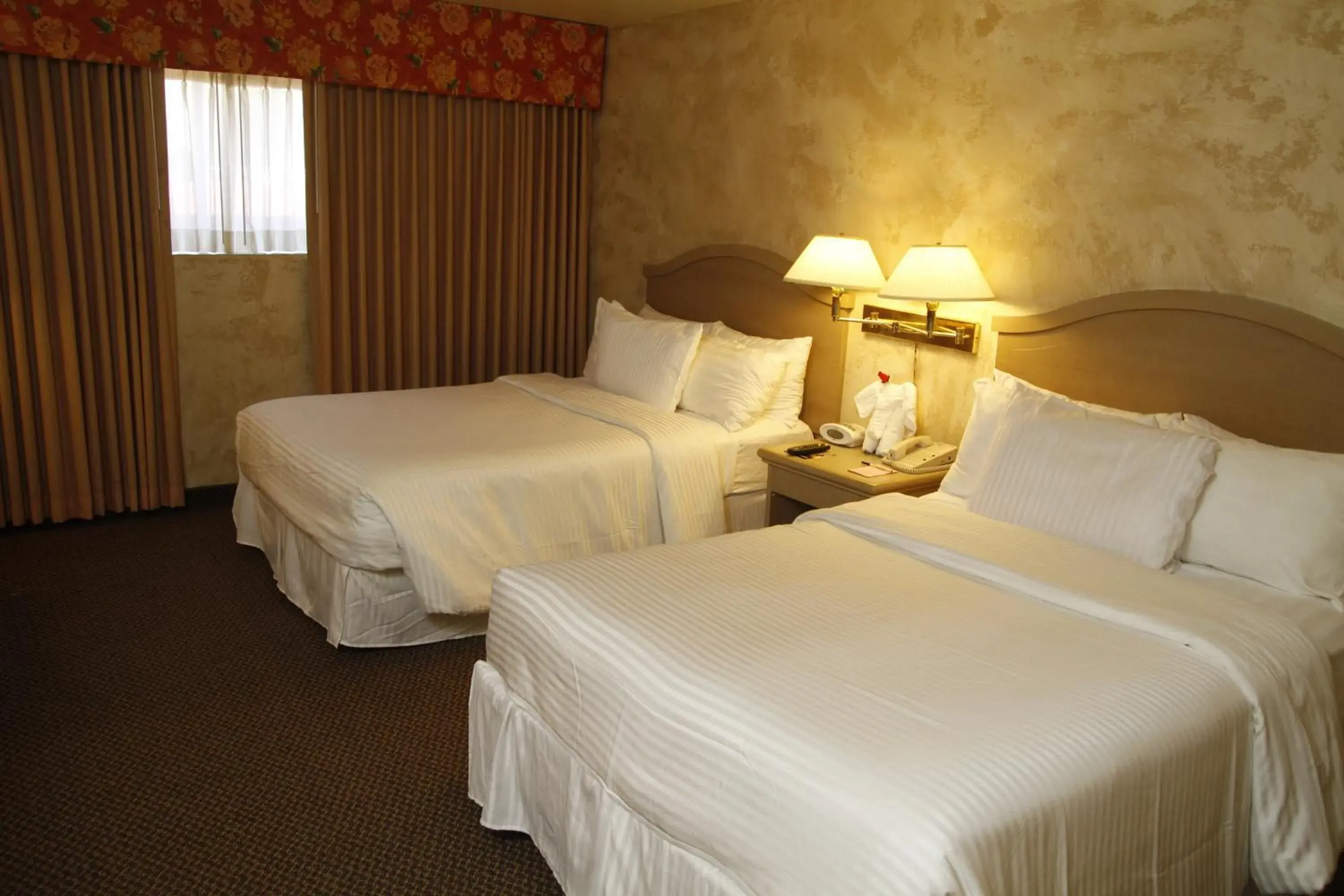Bed in Ramada by Wyndham Viscount Suites Tucson East Bed in Ramada by Wyndham Viscount Suites Tucson East