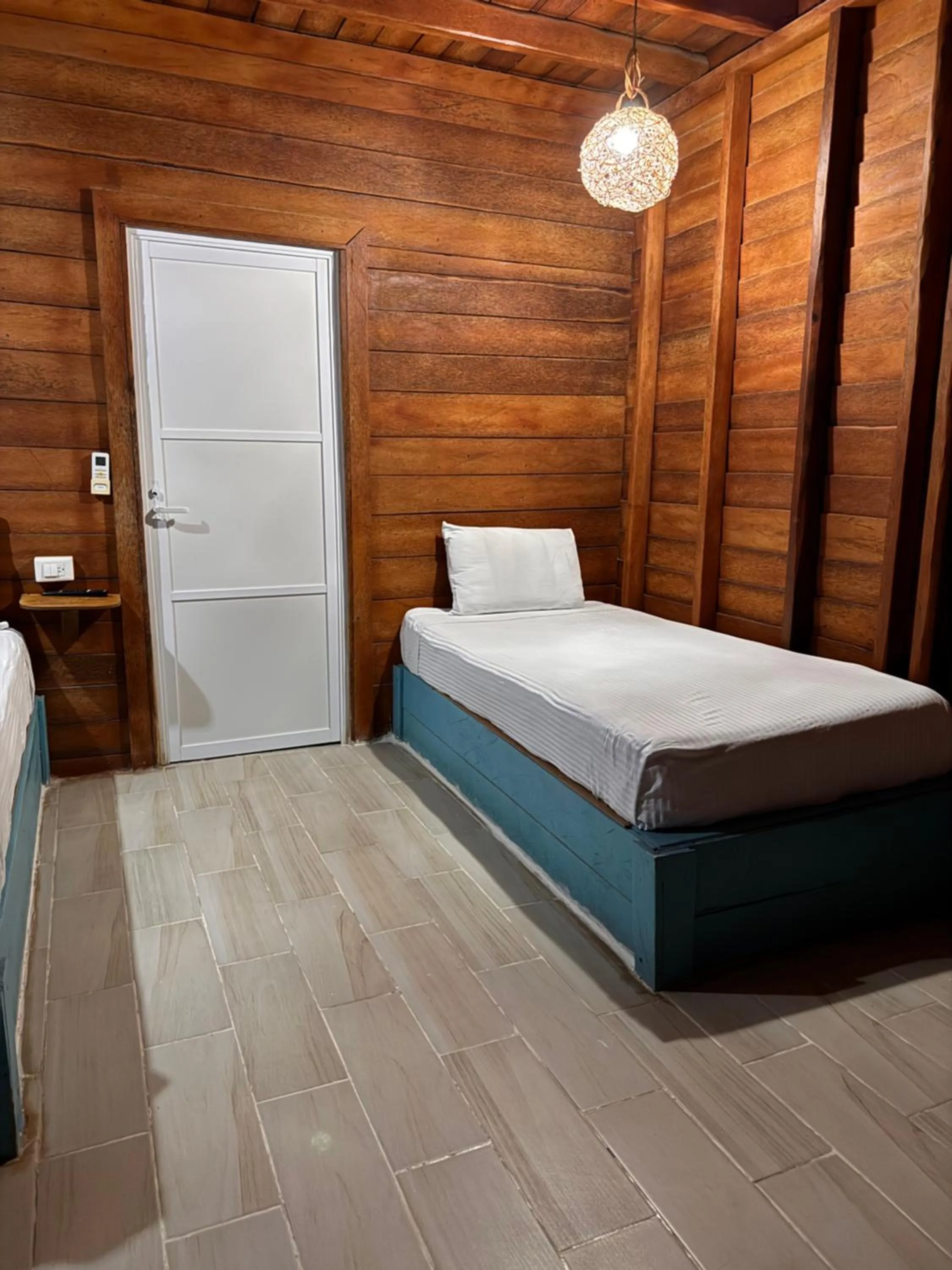 Bed in Hotelito Villas Holbox