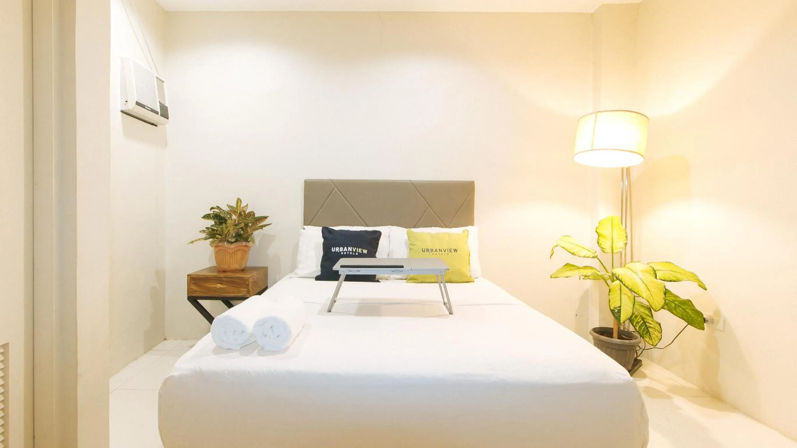 Bedroom, Bed in UrbanView at Lacson Street Bacolod City by RedDoorz